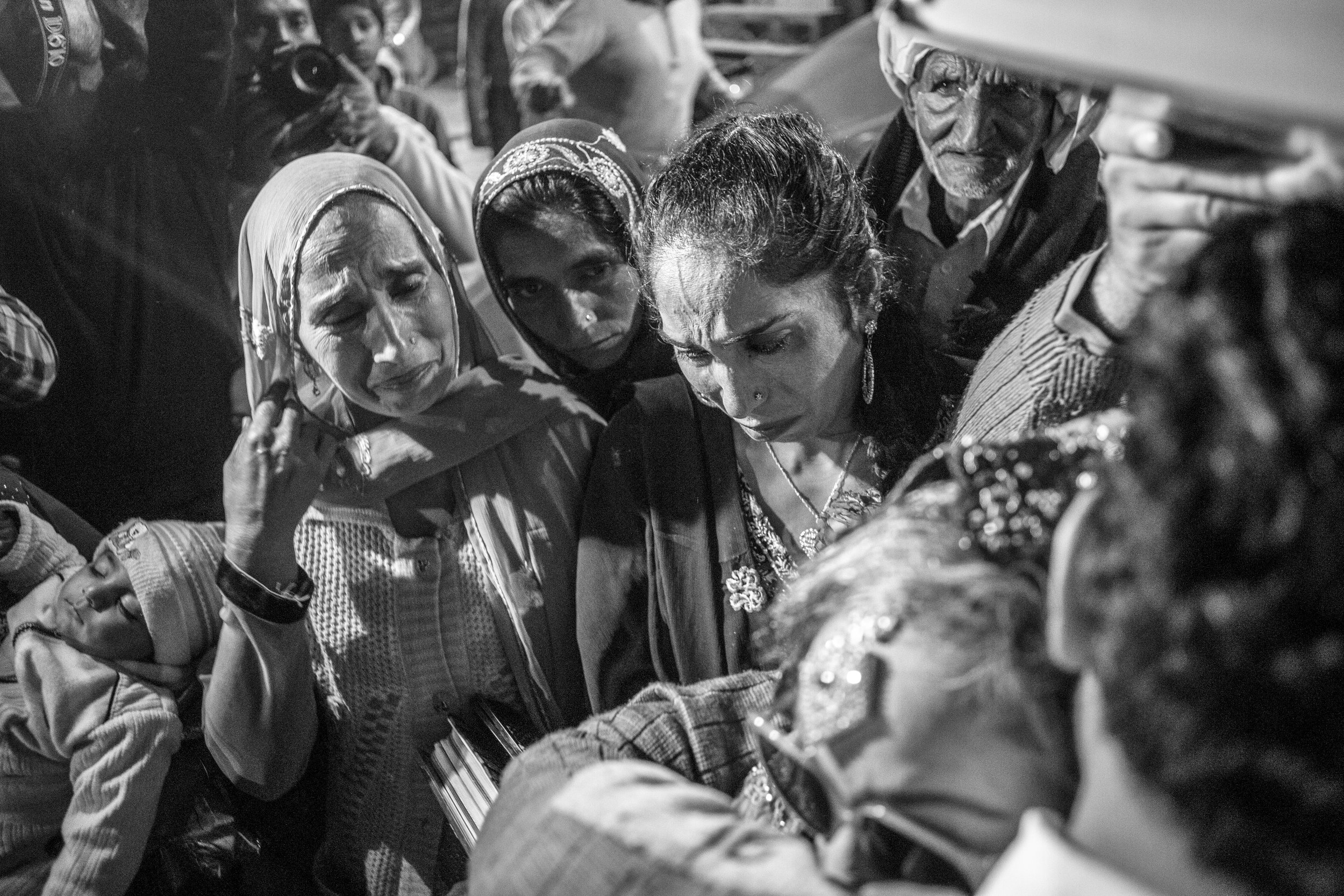  Sarwari Bibi's sisters get emotional while they bid good bye to her after her wedding ceremony on Jan. 7, 2016 in Lahore, Pakistan. 