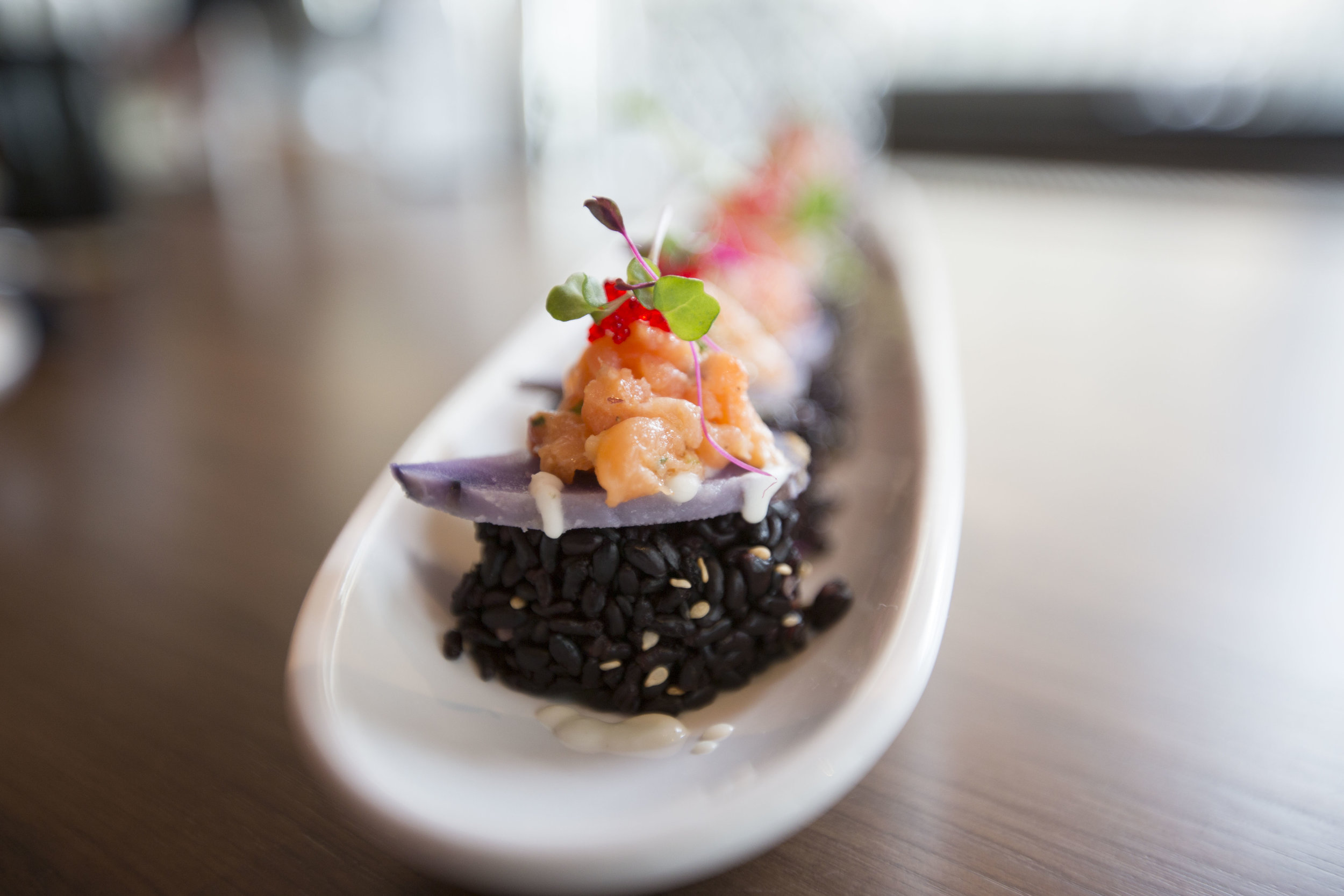  Violet roll with clack rice, spicy albacore, avocado, jalapeno, peruvian potato, smoked salmon tartar and cauliflower puree at Red Dine Sushi on Sep 16, 2016 in Madison, WI.&nbsp; 