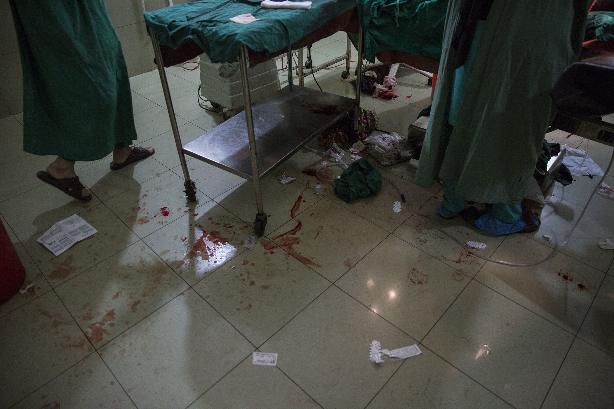  Blood seen on the floor inside the operation theatre as Nosheela has started bleeding again after her C-section was complete. 
