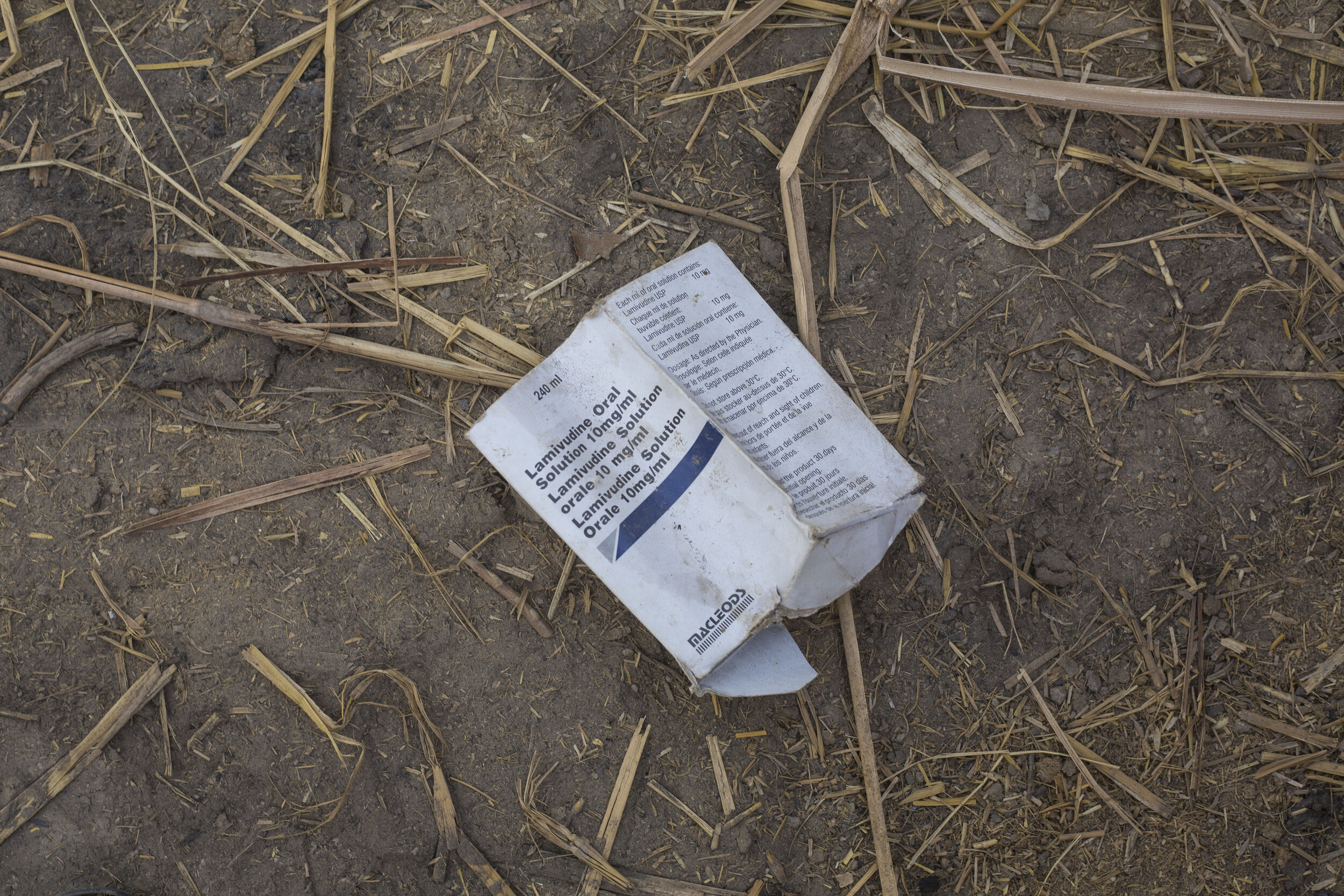  An empty box of HIV medication on the floor in Subhani Shar village, around 8 km from Ratodero where at least 23 people have been infected with HIV on July 25, 2019 in Sind, Pakistan.  