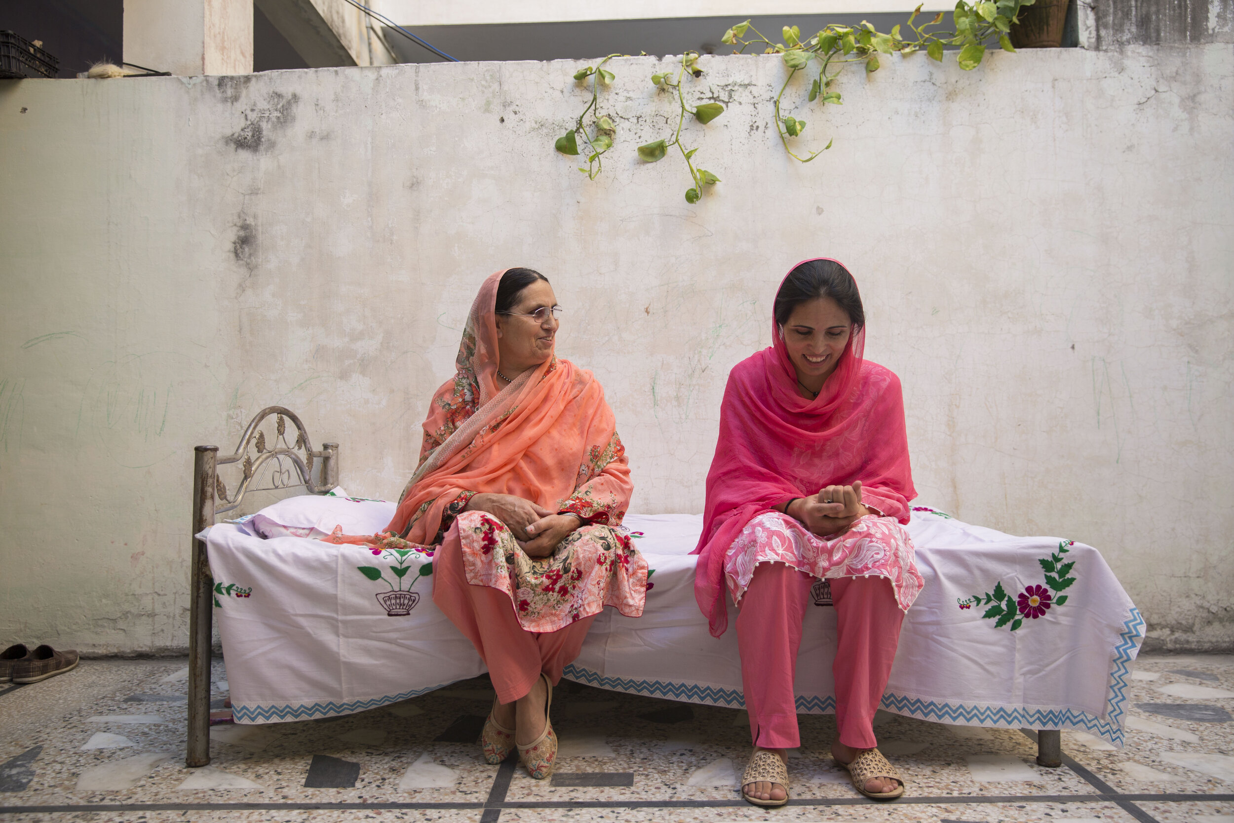  Nusrat Bibi, spends time with her mother Nurbano as Bibi and her brother struggle to make ends meet. 
