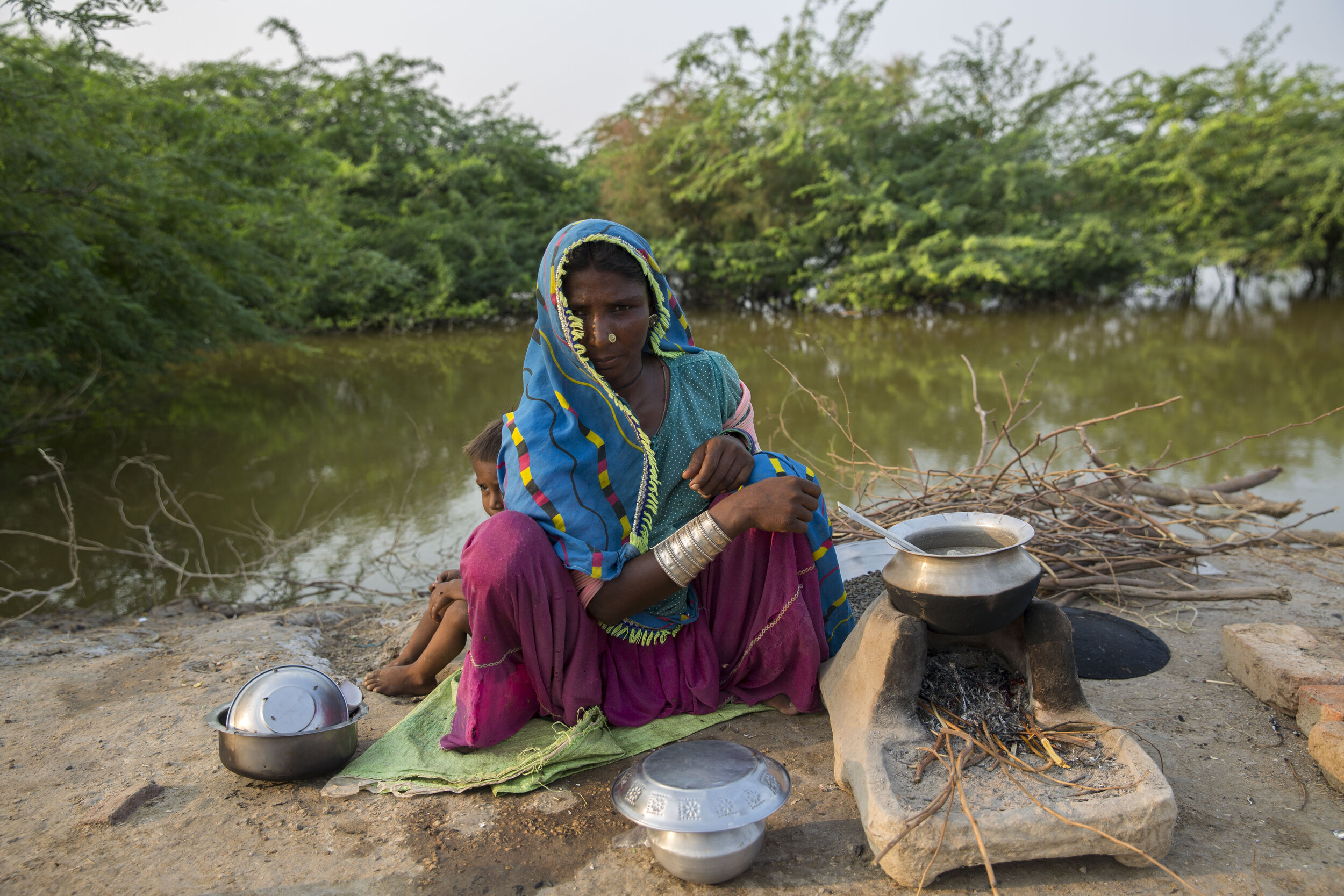  Keysari roasts sunflower seeds in an informal settlement as her family lost their belongings and home. 