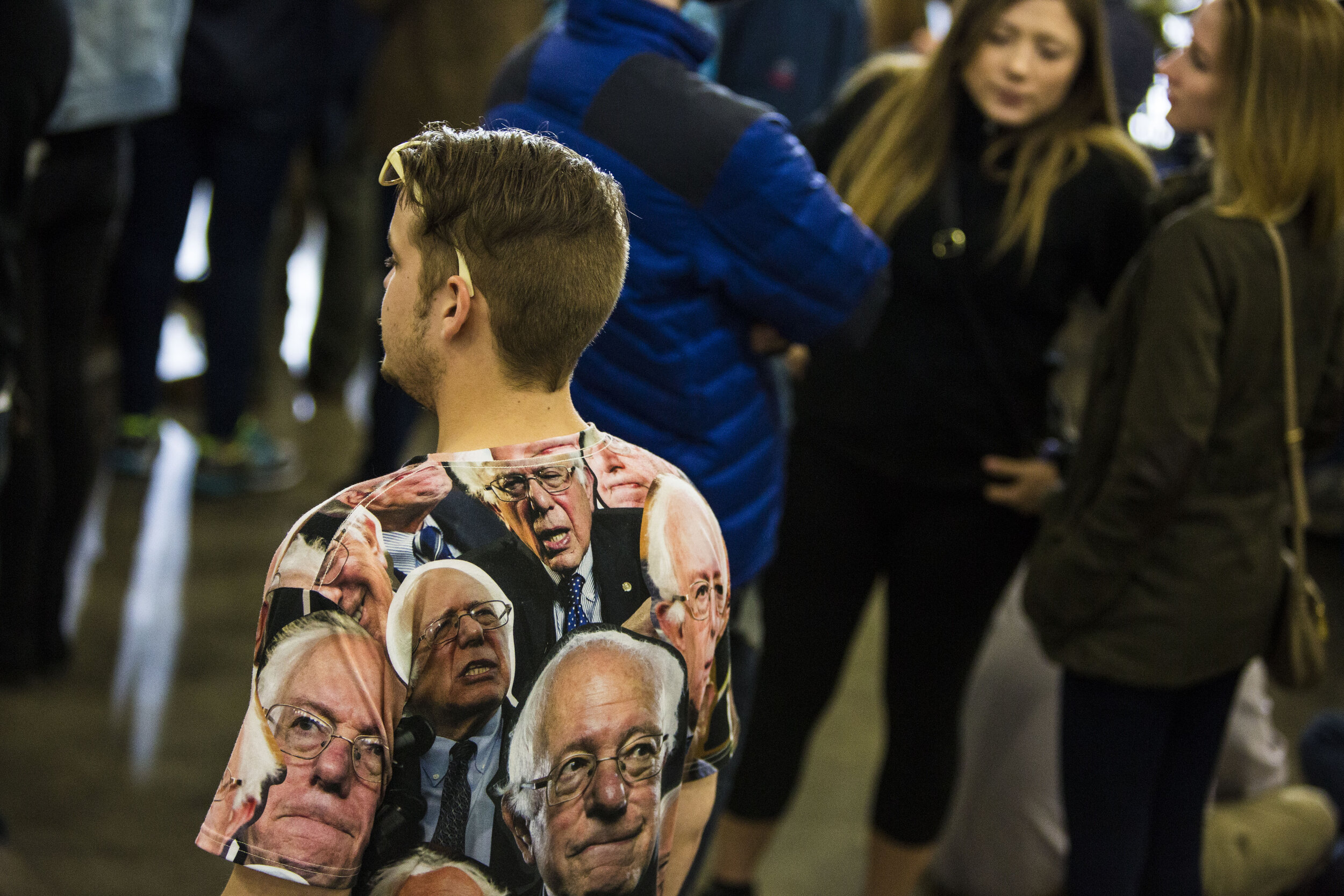 Todd Bass, a Bernie Sanders supporter wears a Sander's shirt at a rally. 