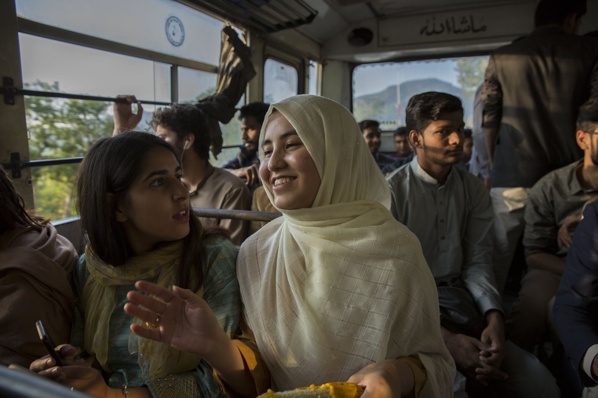  Bibi takes a bus with fellow university students to a mall. The outing would have been rare back in Quetta. 