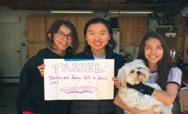 (from left to right): TASSEL volunteers Sophia Arnao, Devon Liu, and Bella Arnao at a TASSEL garage sale