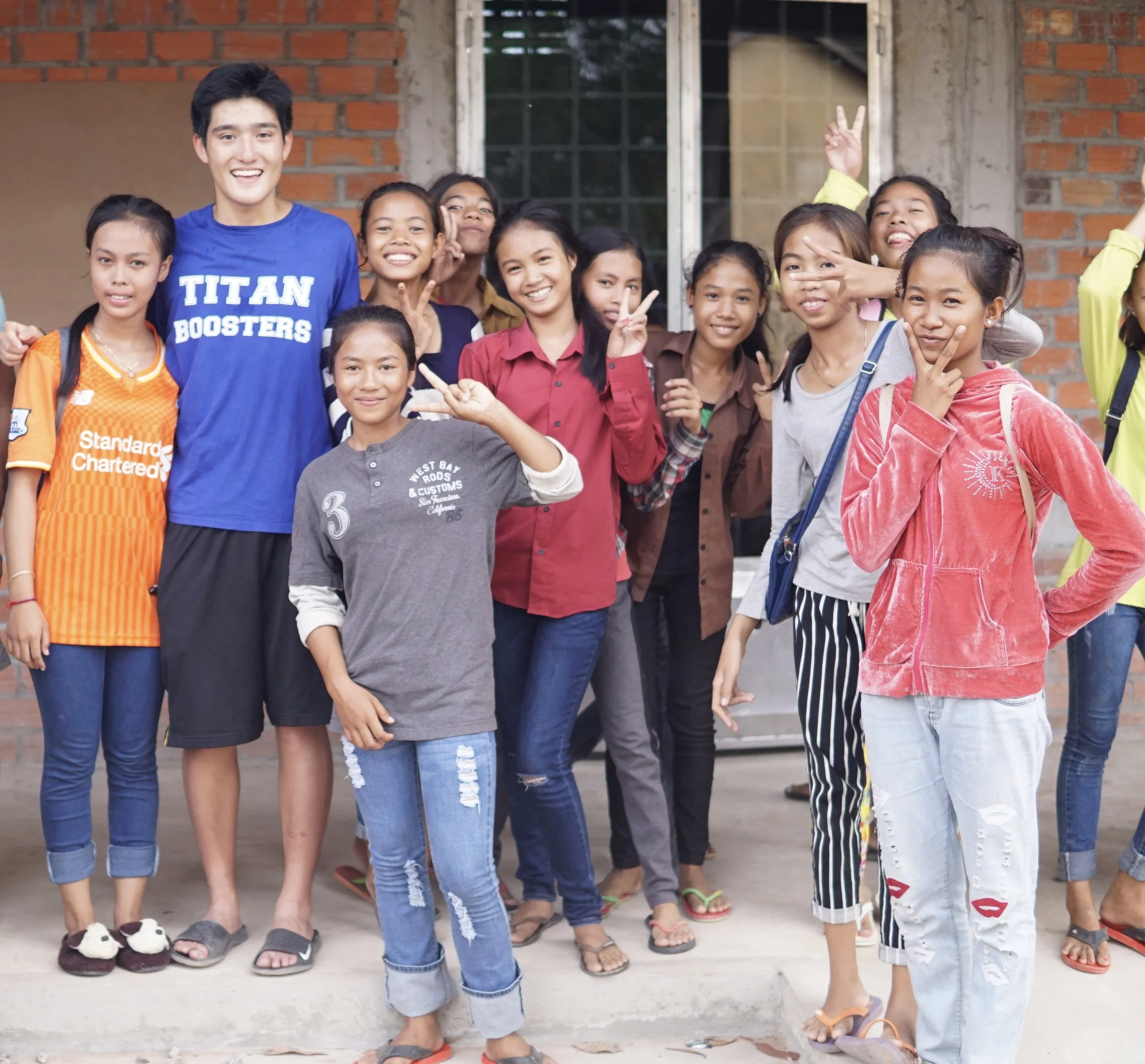 Wilson with students of the Samrang TASSEL School, 2016. 