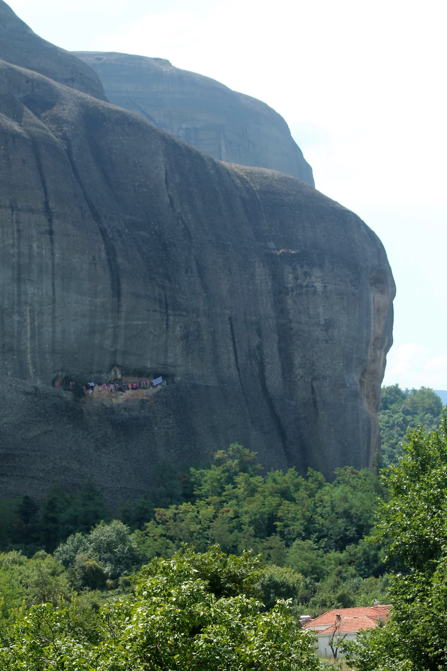 Not laundry in this photos, once a year villagers climb (yes rock climb) up to that spot and hang a scarf as a thank you to the god who saved a ladies husband decades ago.