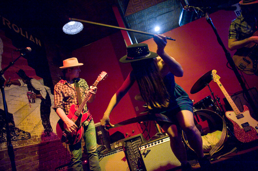 Watch Ohio natives Angela Perley n the Howlin' Moons perform at the Ohio Pawpaw Festival , this coming Saturday. Here, Angela Perley plays her musical saw during a song, at the Marietta Brewing Company . 
