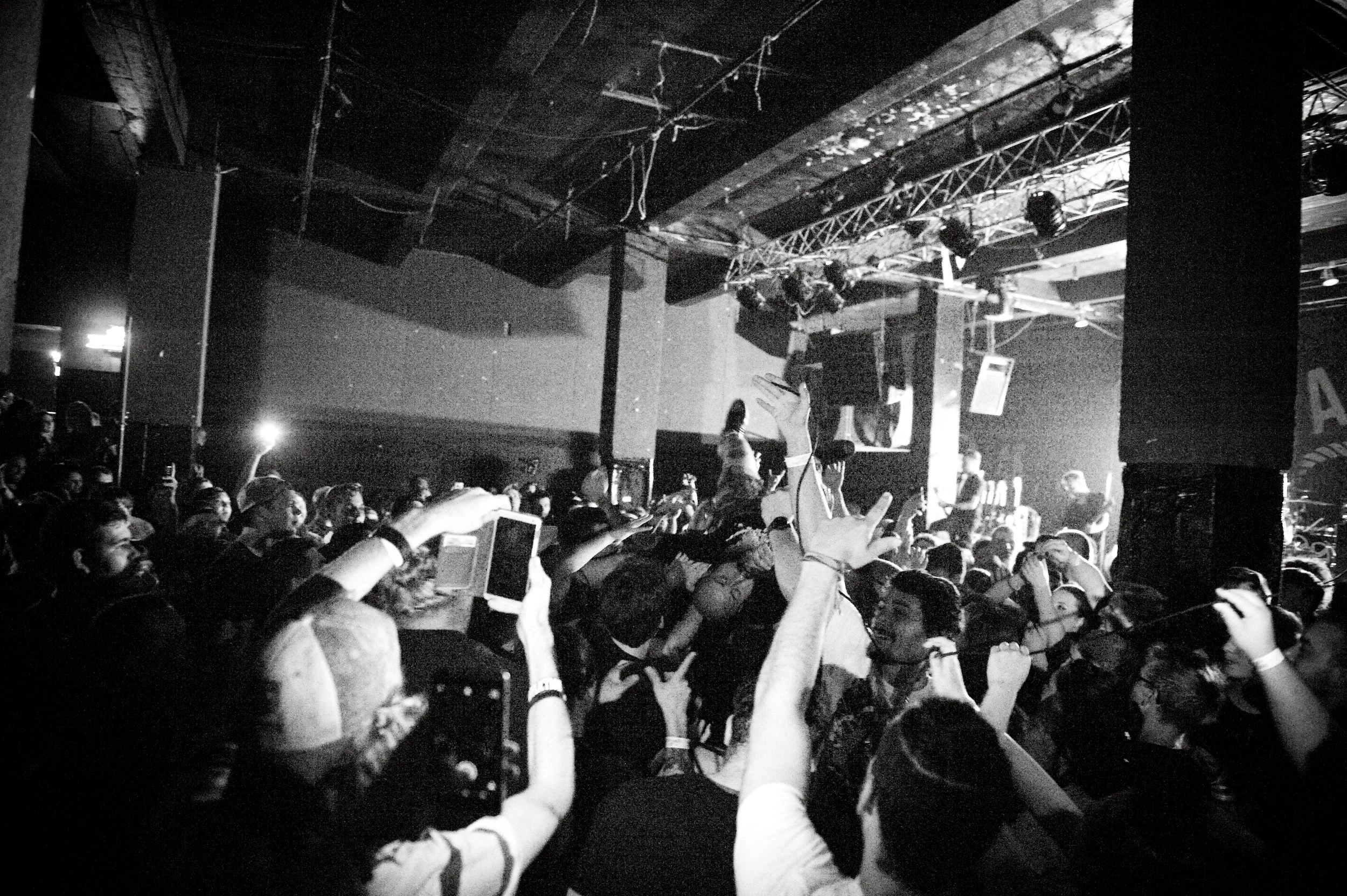 Joel Quartuccio (of Being As An Ocean) often interacts with the crowd during his performance. Here, he crowd surfs toward the end of the set, after telling everyone in the room that he trusted them. Photo by Michelle Waters . 