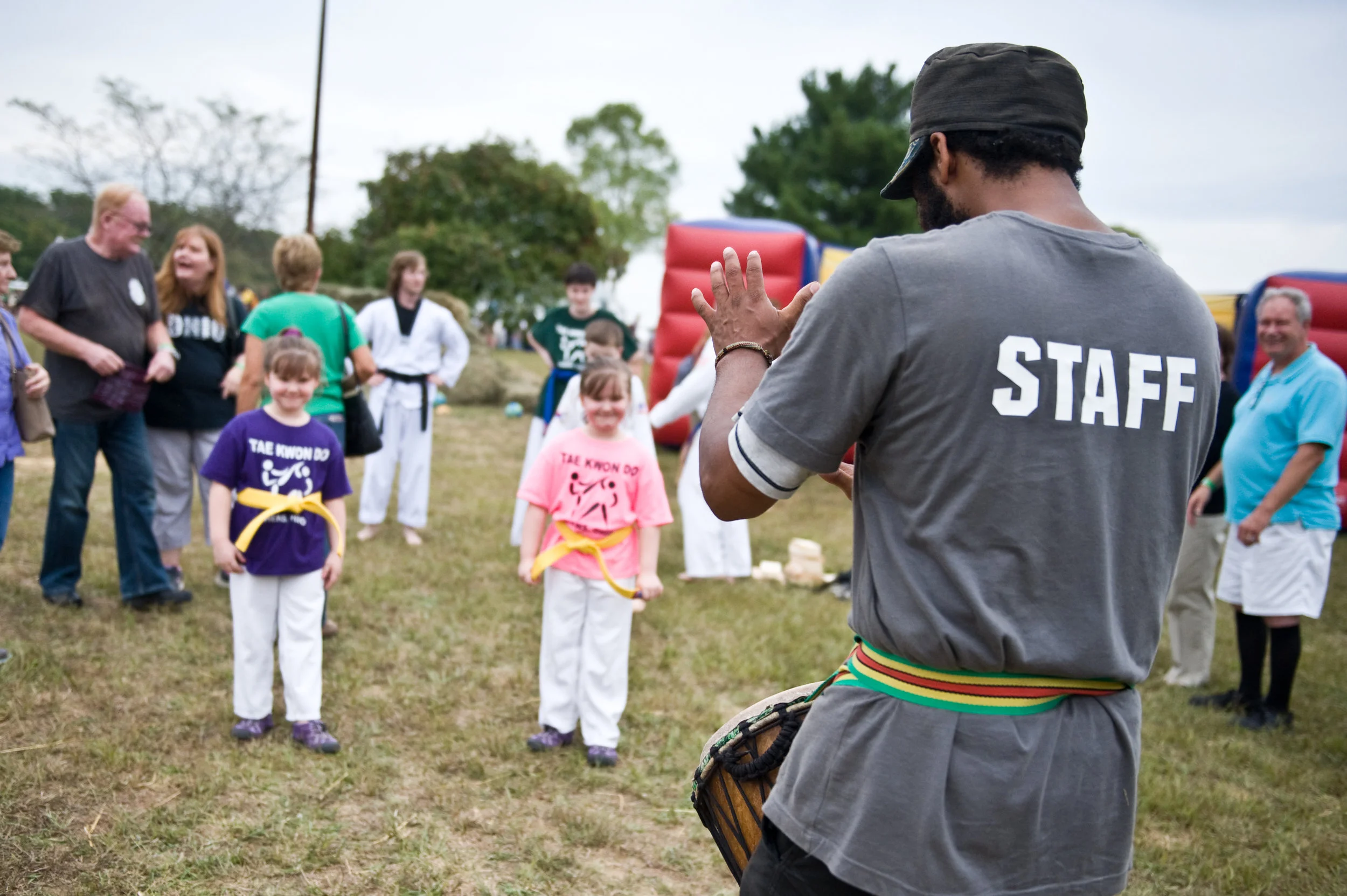 Lawrence Green, drumming the crowd together for the festival's Tae Kwan Do demonstration. Lawrence is part of the RAW (Rising Appalachian Warriors) program, which has summer camps for kiddos, and also hosted the kids' tent at the fest. Photo by Michelle Waters