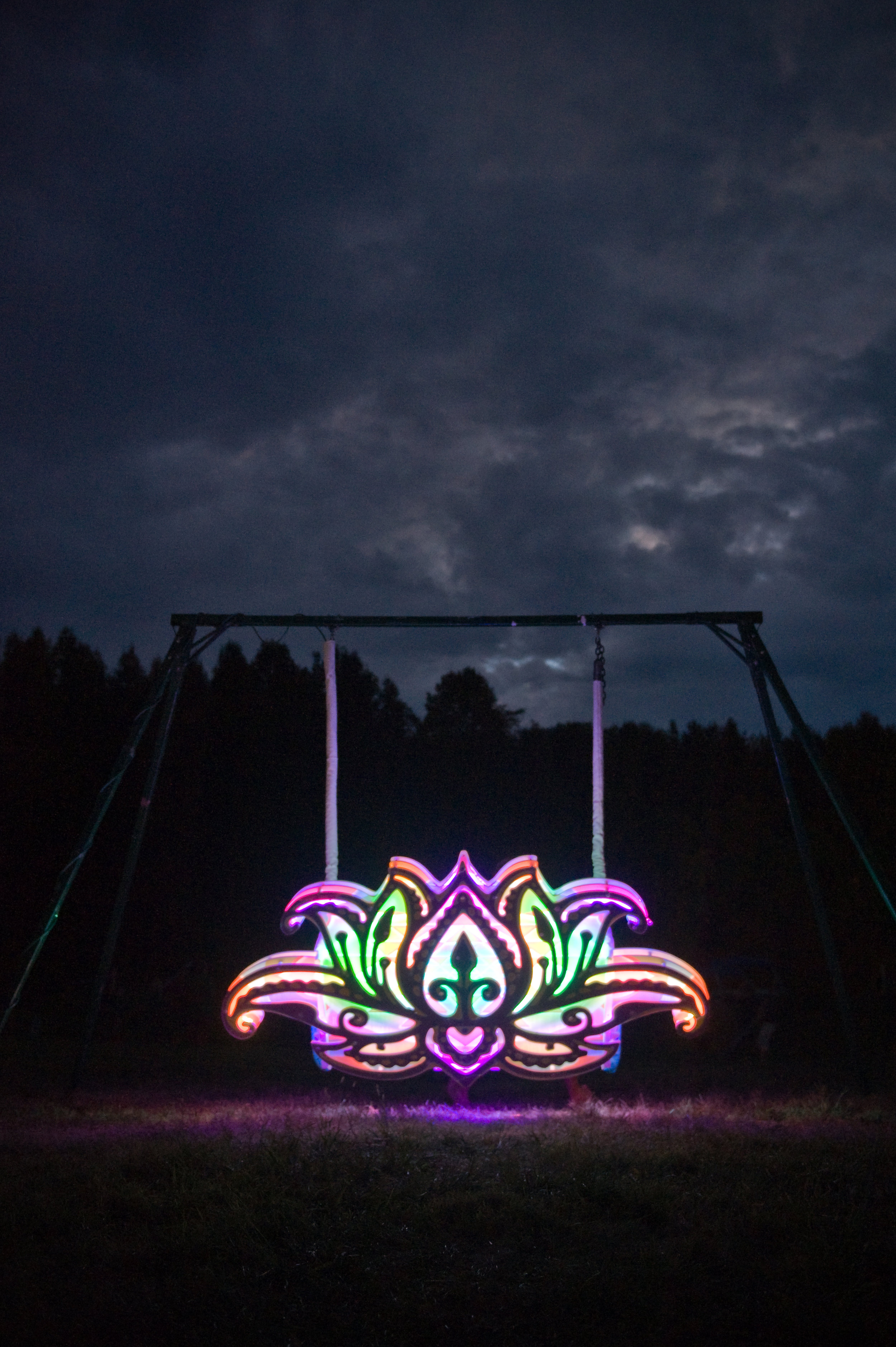 When you go next year, be sure to look for cool, interactive artwork like this rainbow swing. Here you can listen to the music gently roll over your ears while you sway back and forth, staring at the sky...photo by Michelle Waters.