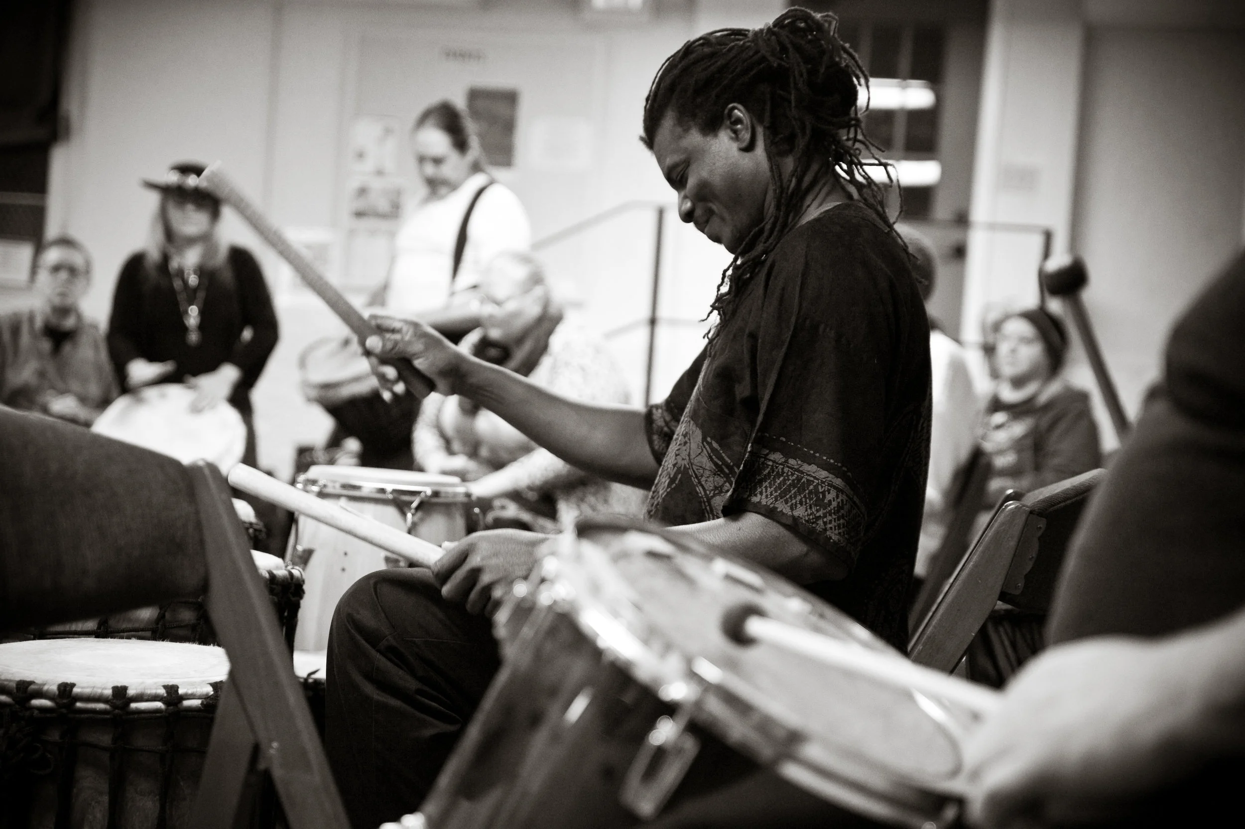Baoku Moses led the drum circle at last week's Drums for Unity, in Marietta, Ohio. Photo by Michelle Waters.