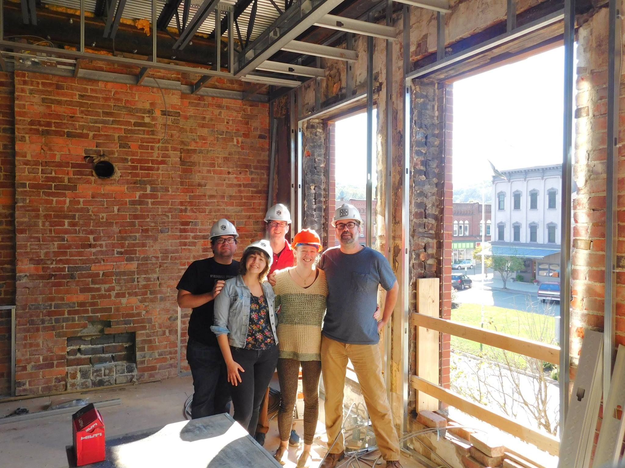 The team at Stuart's Opera House pose for a quick photo in the midst of the construction on this impressive project. Photo provided by Stuart's Opera House. 