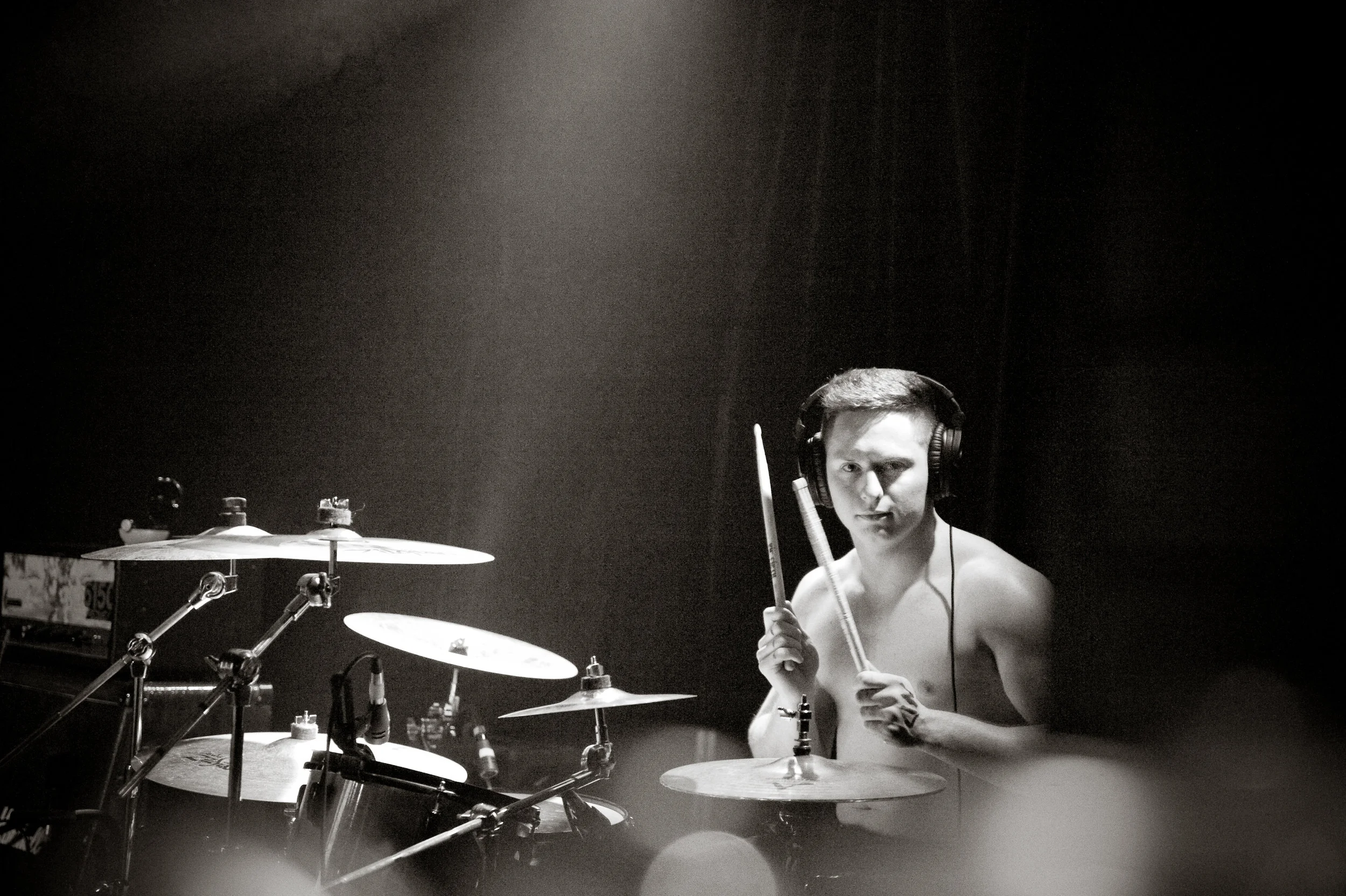 Sam Hartiens keeps the beat going as drummer for Riviera. Photo by Michelle Waters . 