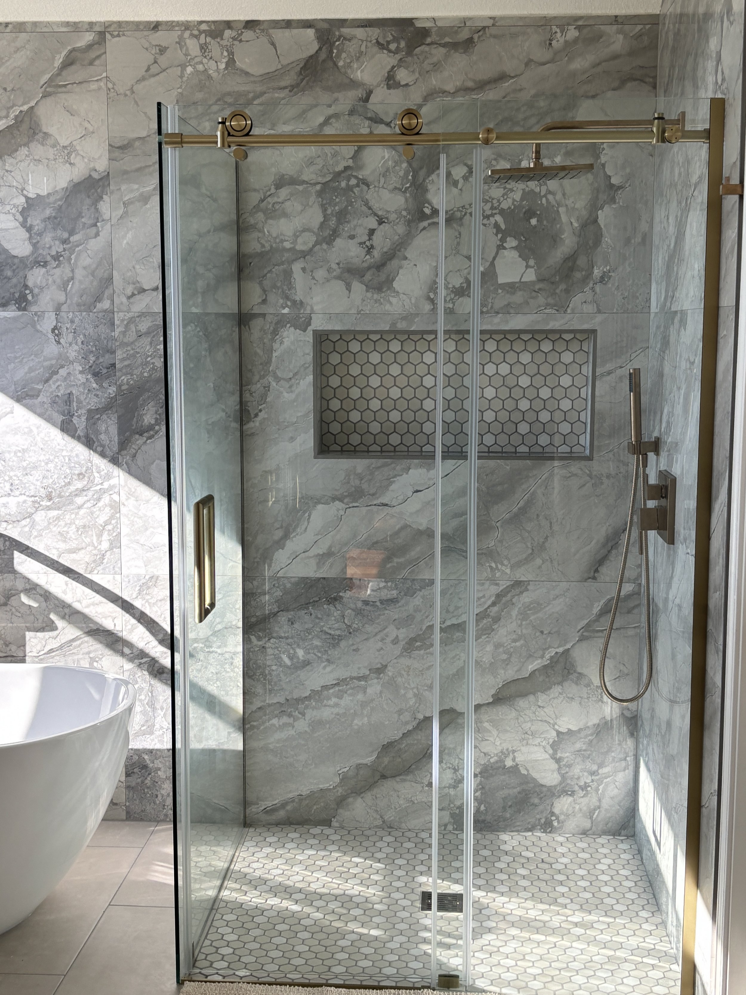 Gray and Gold Shower Remodel