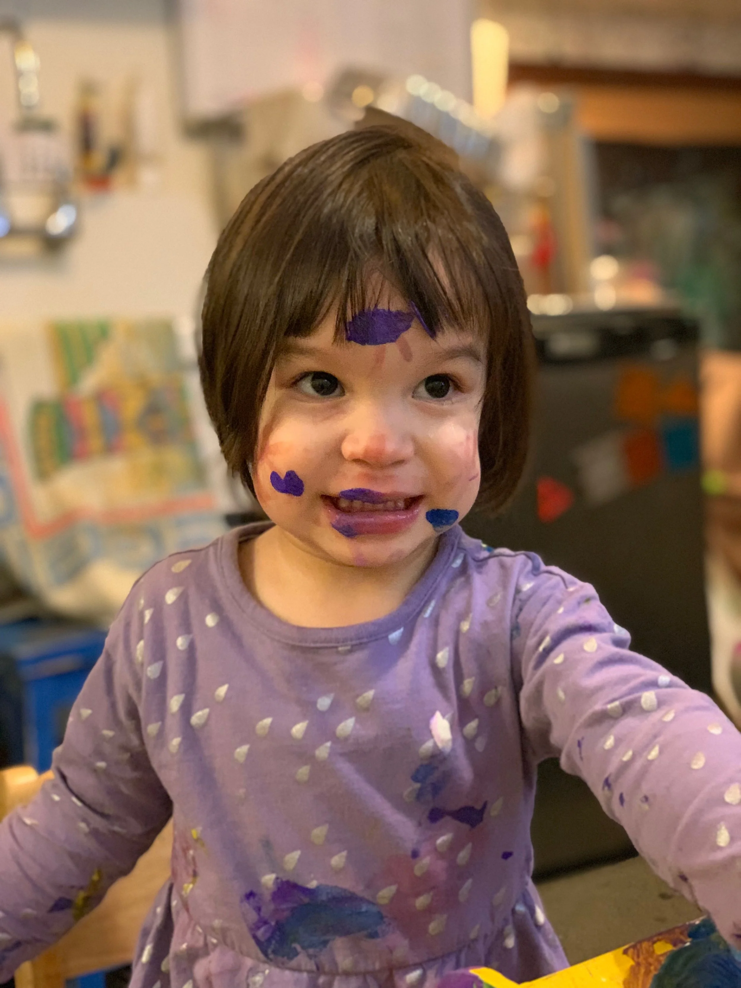 Purple painting pre-schooler