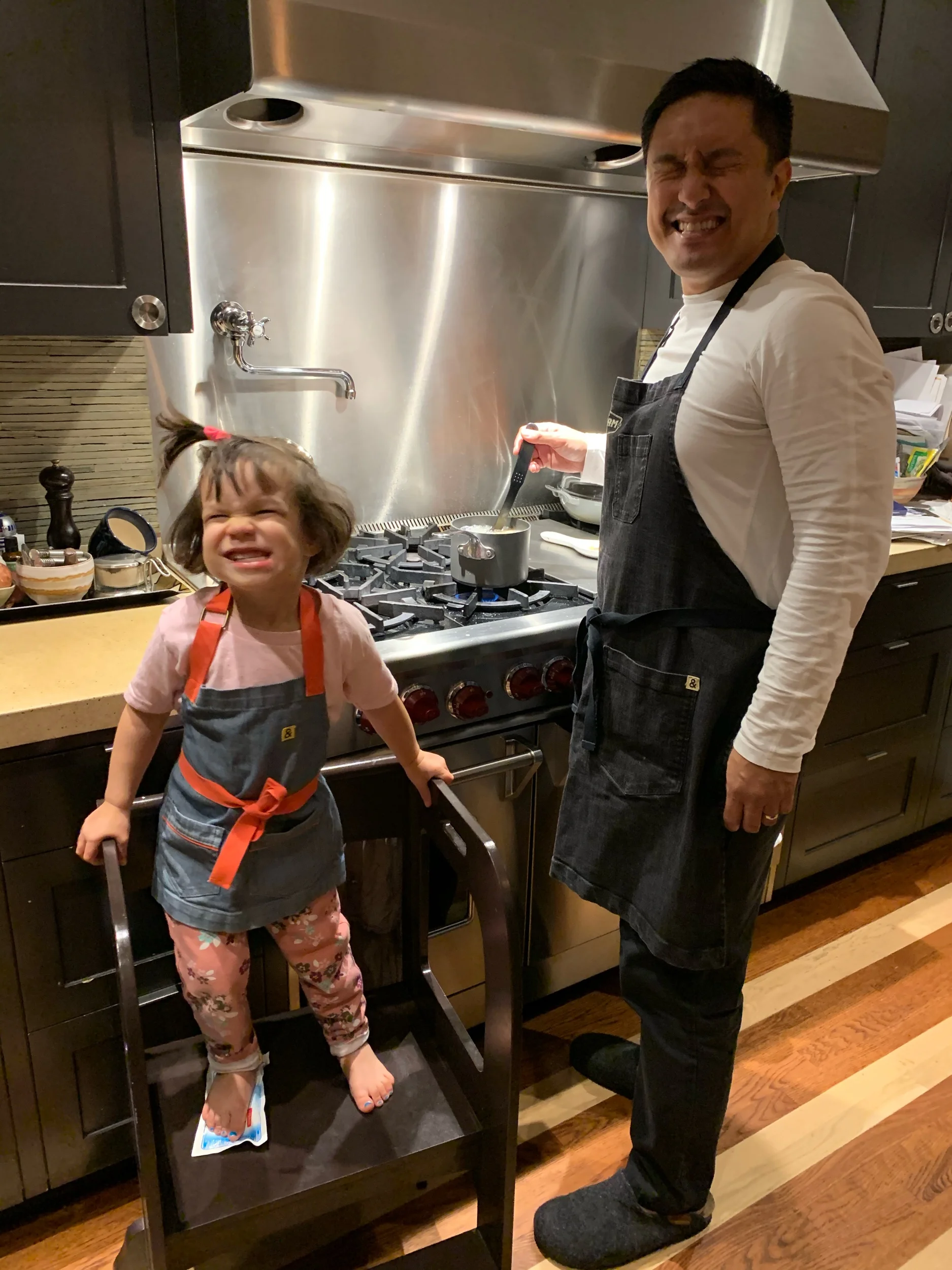 “Let’s put our aprons on and cook, Dada”