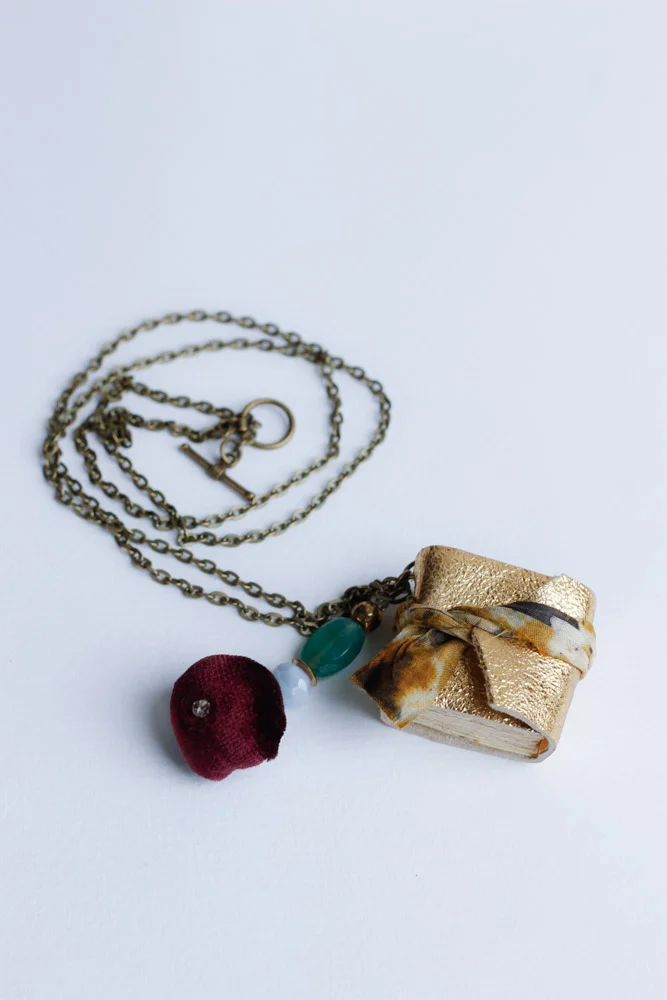 gold leather book necklace