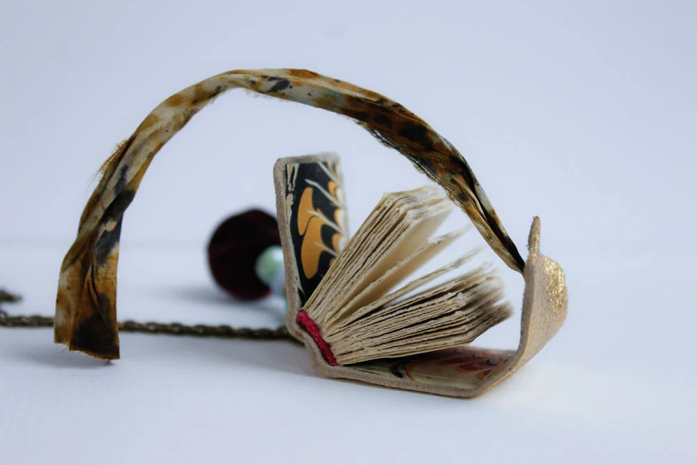 gold leather book necklace