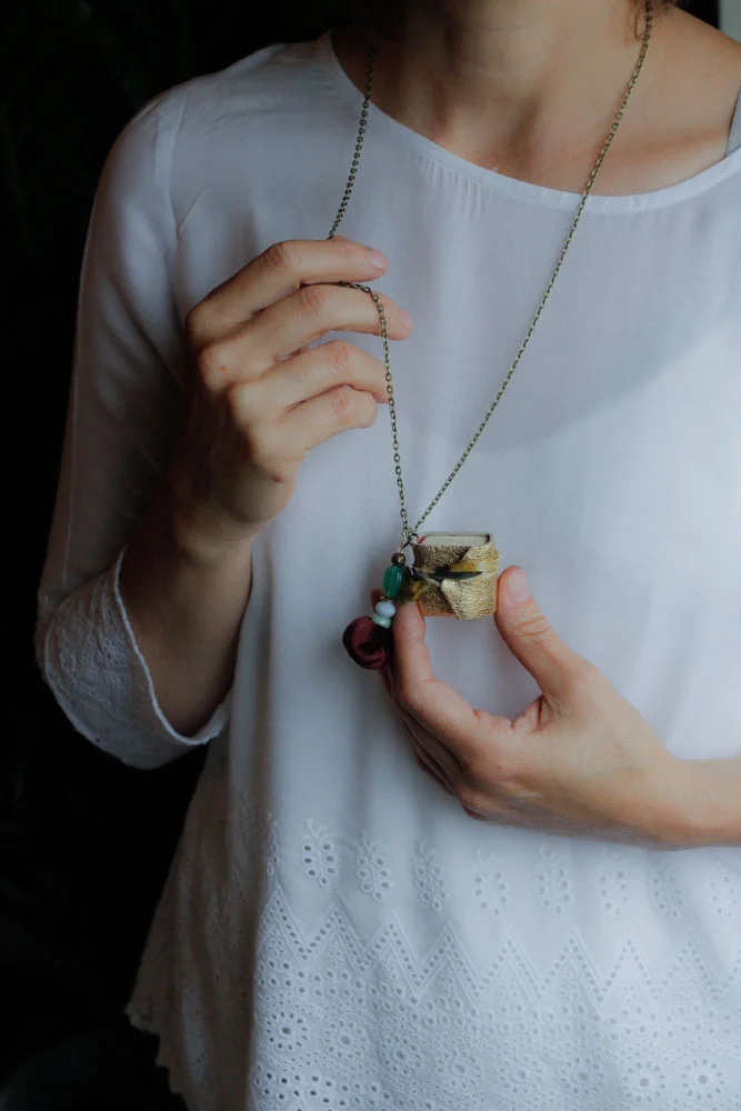 gold leather book necklace