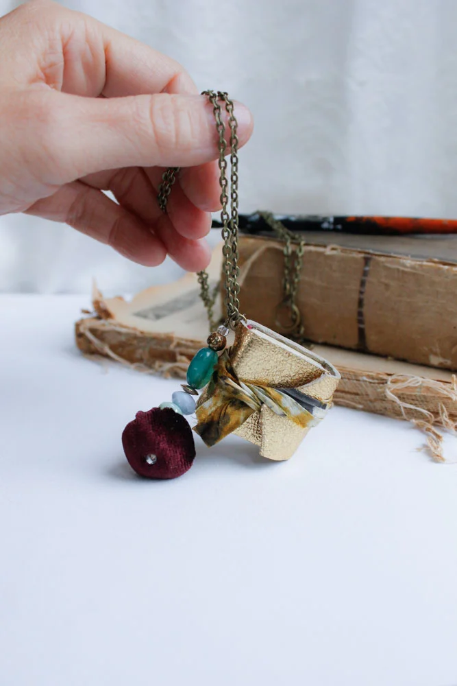 gold leather book necklace