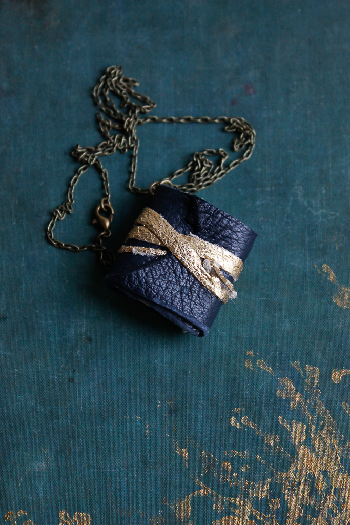 reclaimed navy blue leather book necklace
