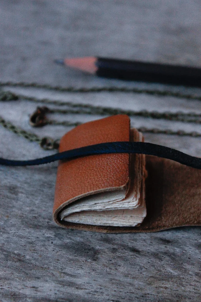 Tan leather book necklace