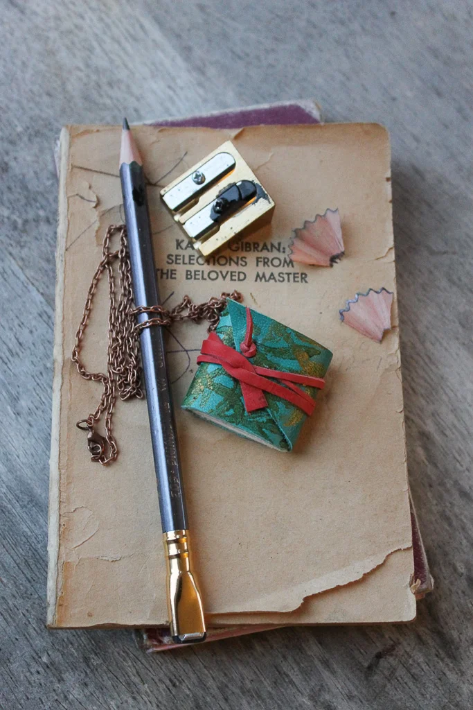 Turquoise leather book necklace