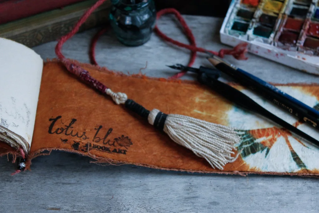 Leather artist scroll
