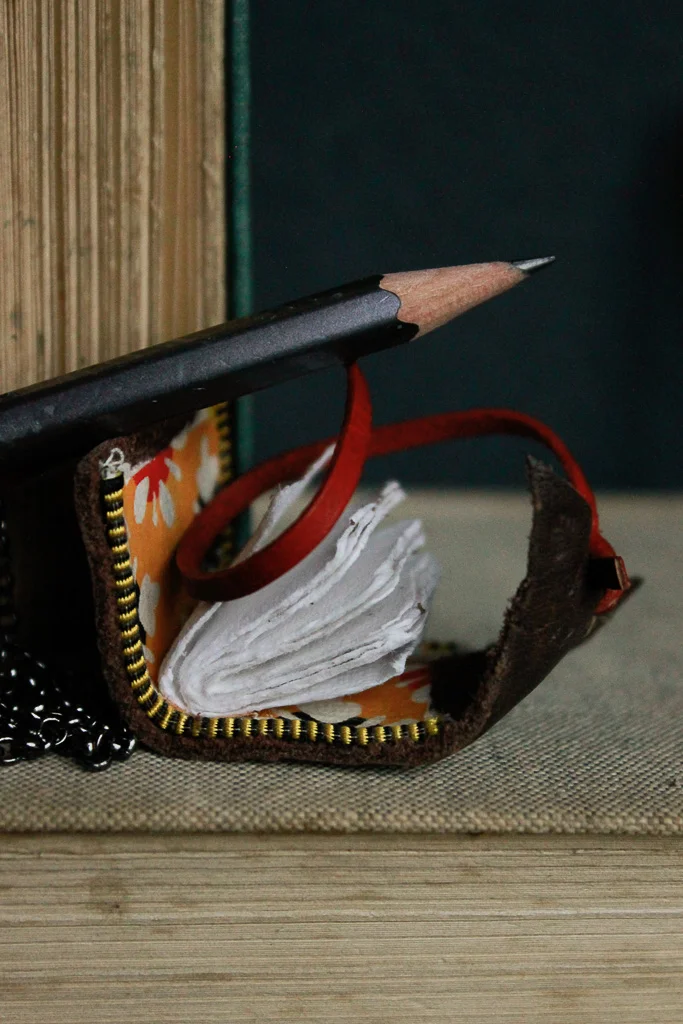 Wee Bean | Miniature leather book necklace with watercolour paper