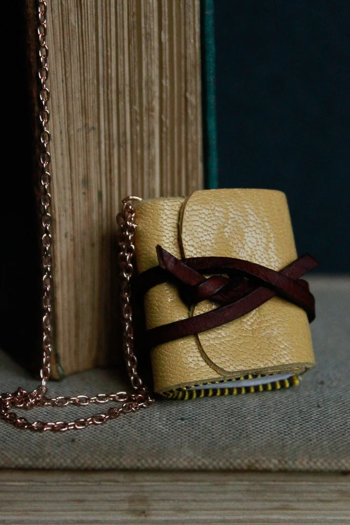 Creme Brûlée | Miniature leather book necklace with watercolour paper | Miniature leather book necklace with watercolour paper