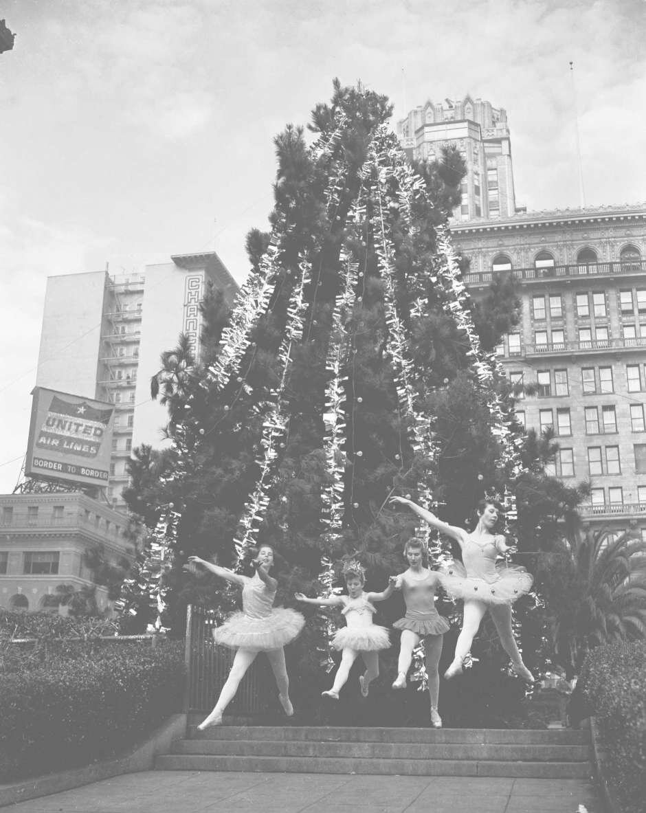 Dancers perform in front of a Christmas tree at Union Square on Dec. 10, 1956.