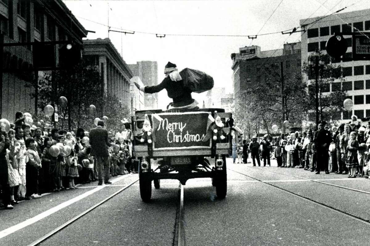 Emporium Santa rolls down Market Street in 1982.