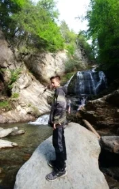 Hiking with grandson Kai. Stopped to see the waterfall in Stowe, VT..