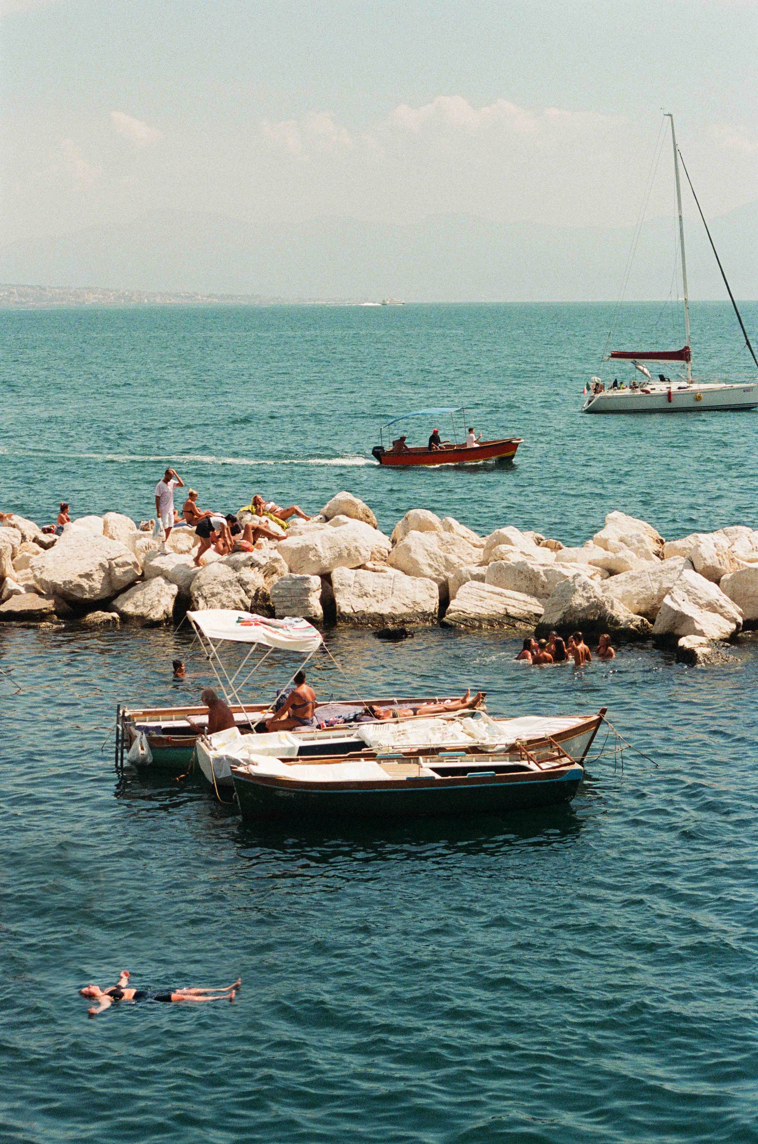 SusanBerry_BerryFace_NaplesItaly_Napoli_StreetPhotoshoot_FilmPhotographer-_Floating_Boats.jpg