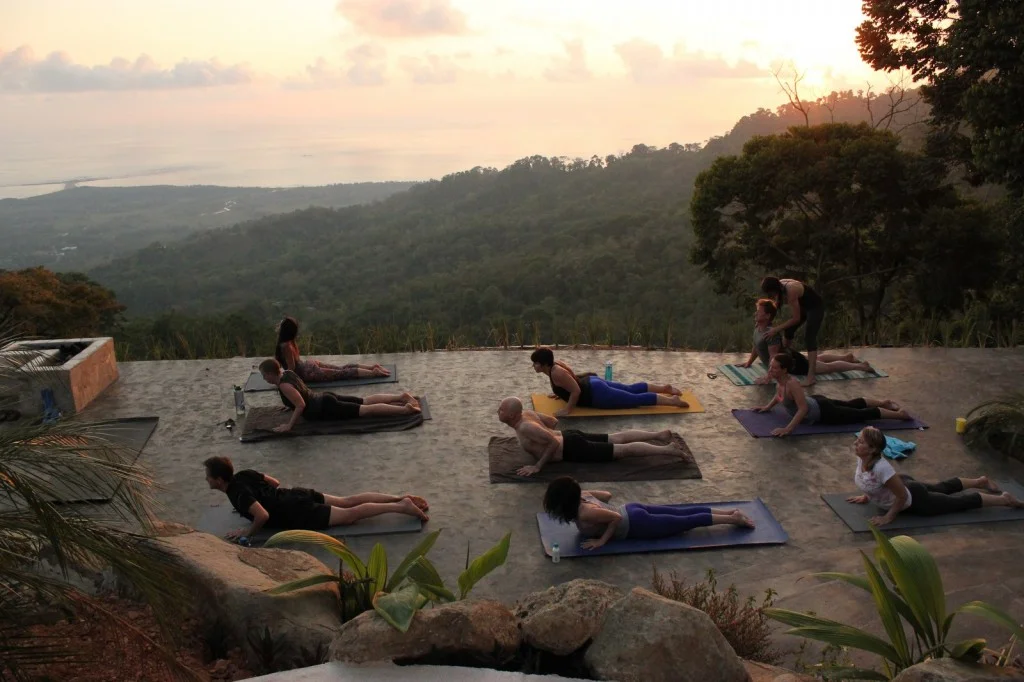 Sunset yoga at Vista Celestial by the fire pit, Costa Rica