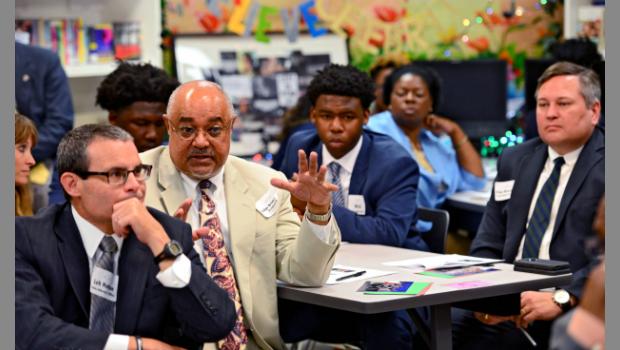 U.S. District Judge Brian Davis asks a question of a participant in an Evac Movement forum in May. The class at Lee High School hosted Mayor Lenny Curry, Sheriff Mike Williams, and a group of judges, attorneys and city leaders at its second annual At-Hope Youth Advisory Forum. (Bob Mack/Florida Times-Union)