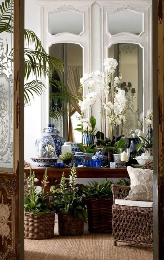 As much as we love our flowers, in our hot summers they just don't last. Using potted flowering plants and greenery adds beauty and texture to any home interior.