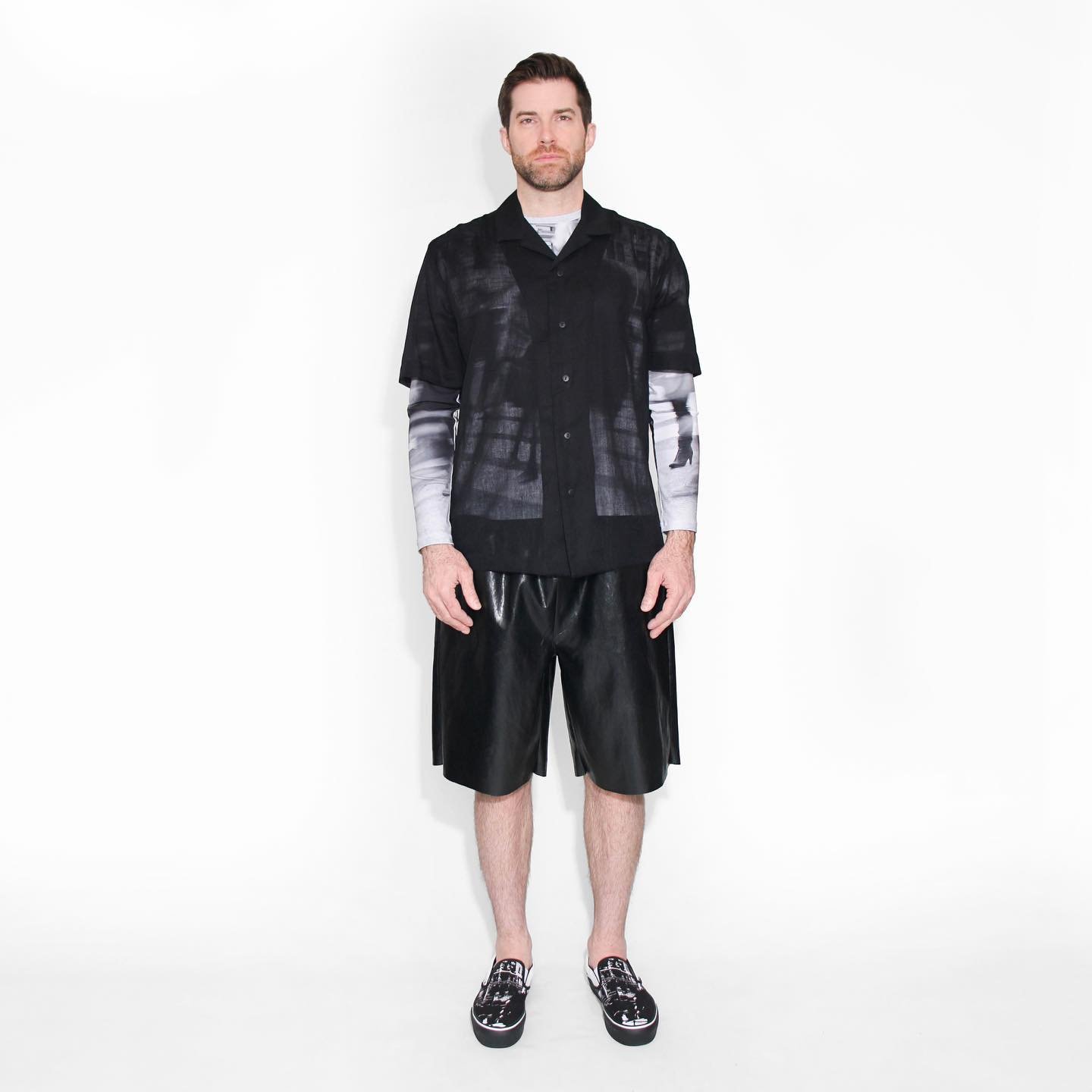 N&deg;9, Urban collection: a black cotton voile short sleeves camp shirt, on top of a long sleeved jersey t-shirt, in our signature print, paired with our unissex black vegan leather boxing shorts.  Part of our ready to wear 2023 collection, and excl