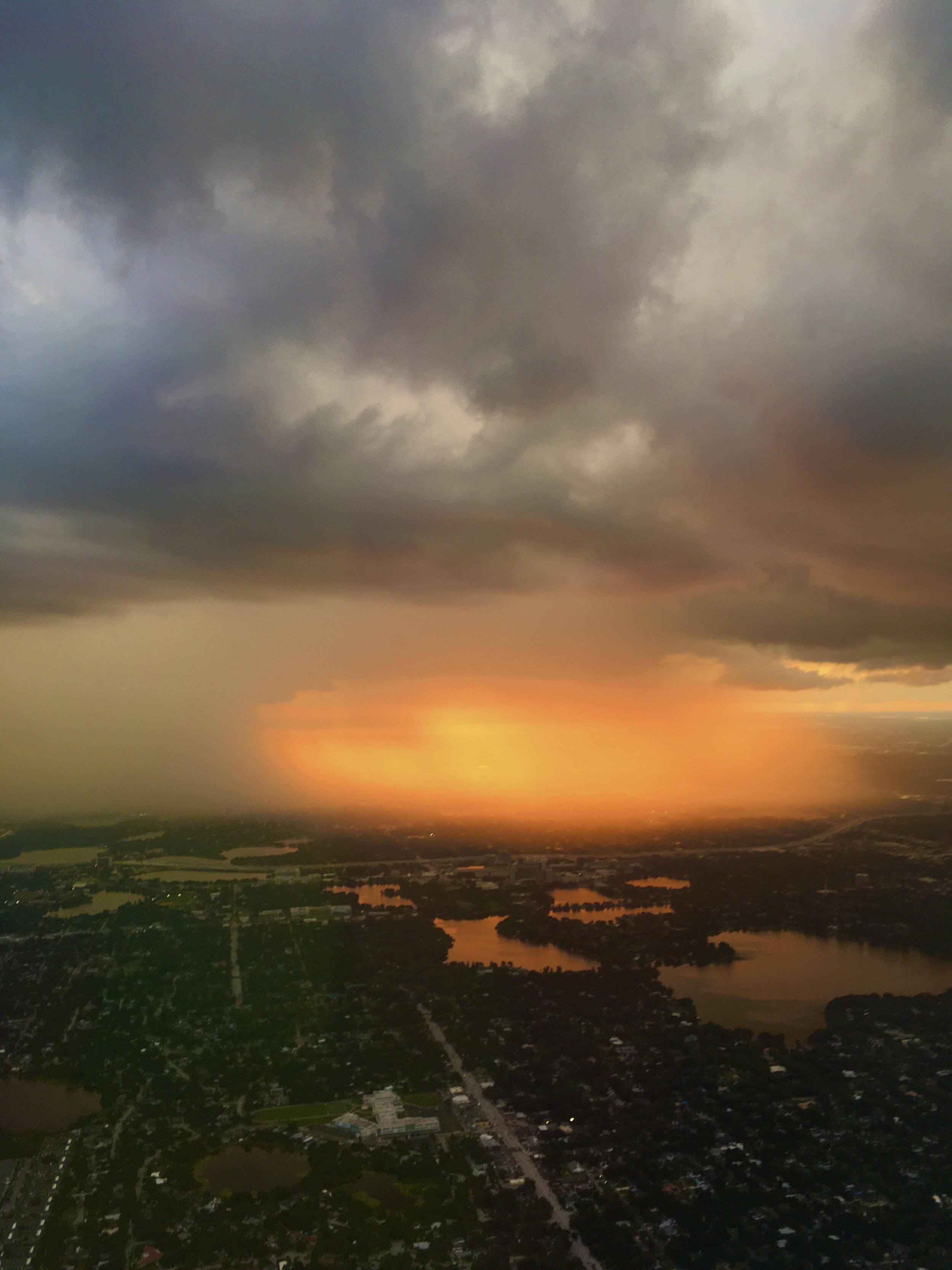 Sunset rainstorm landing in Orlando, Florida