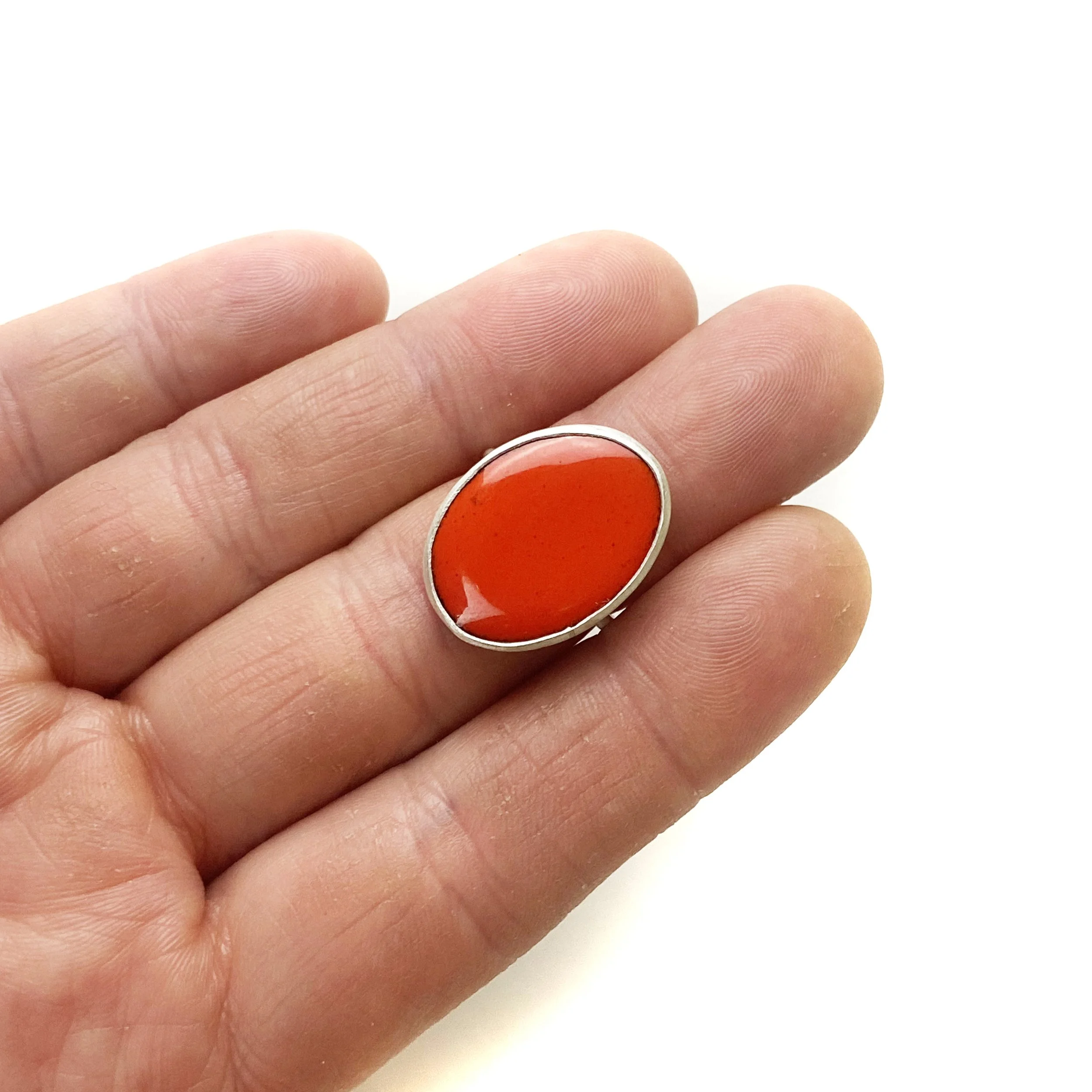 red oval ring hand.jpg
