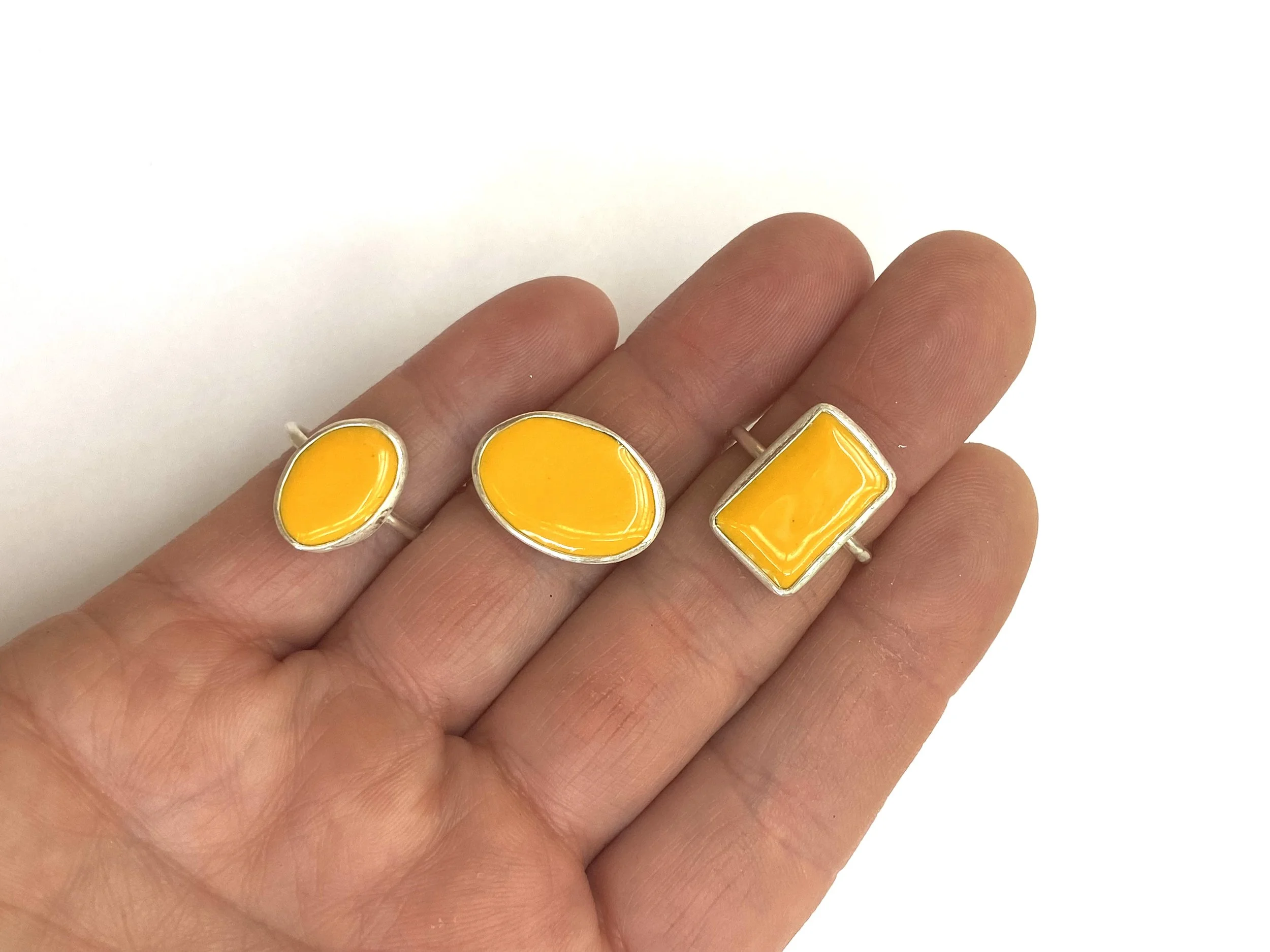 Yellow Enamel Rings modeled.jpg