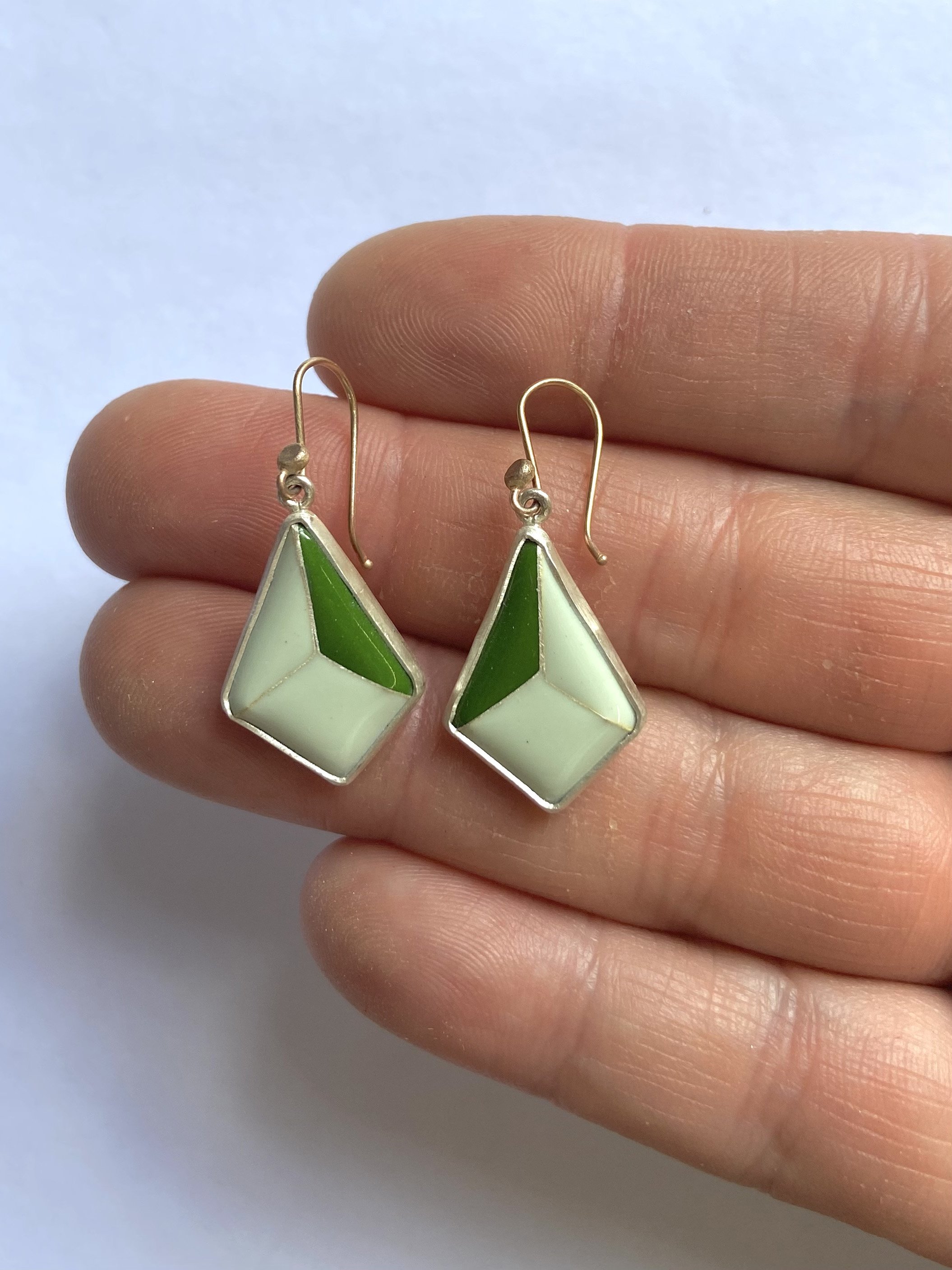 Green diamante earrings hand.jpg