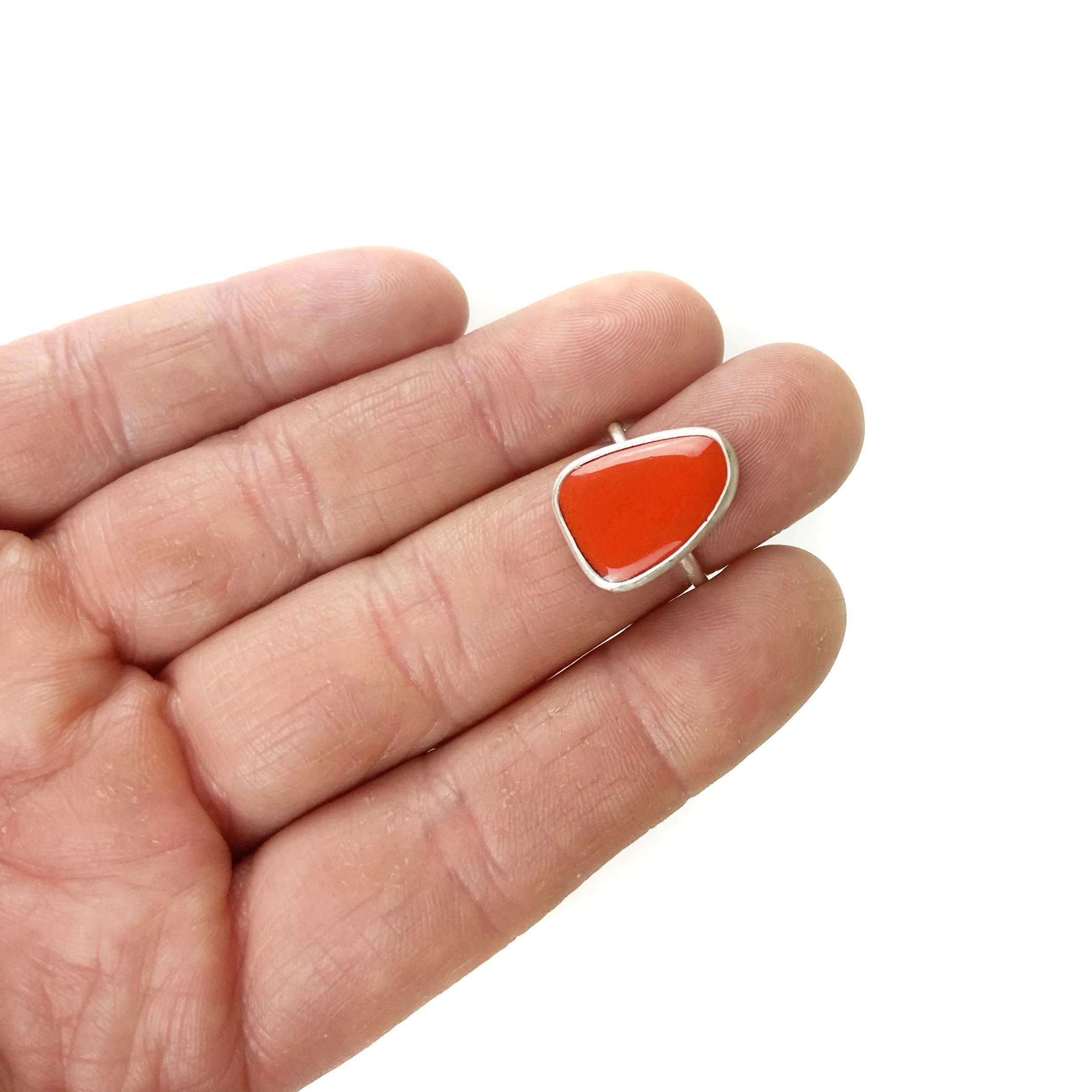 red triangle ring hand.jpg