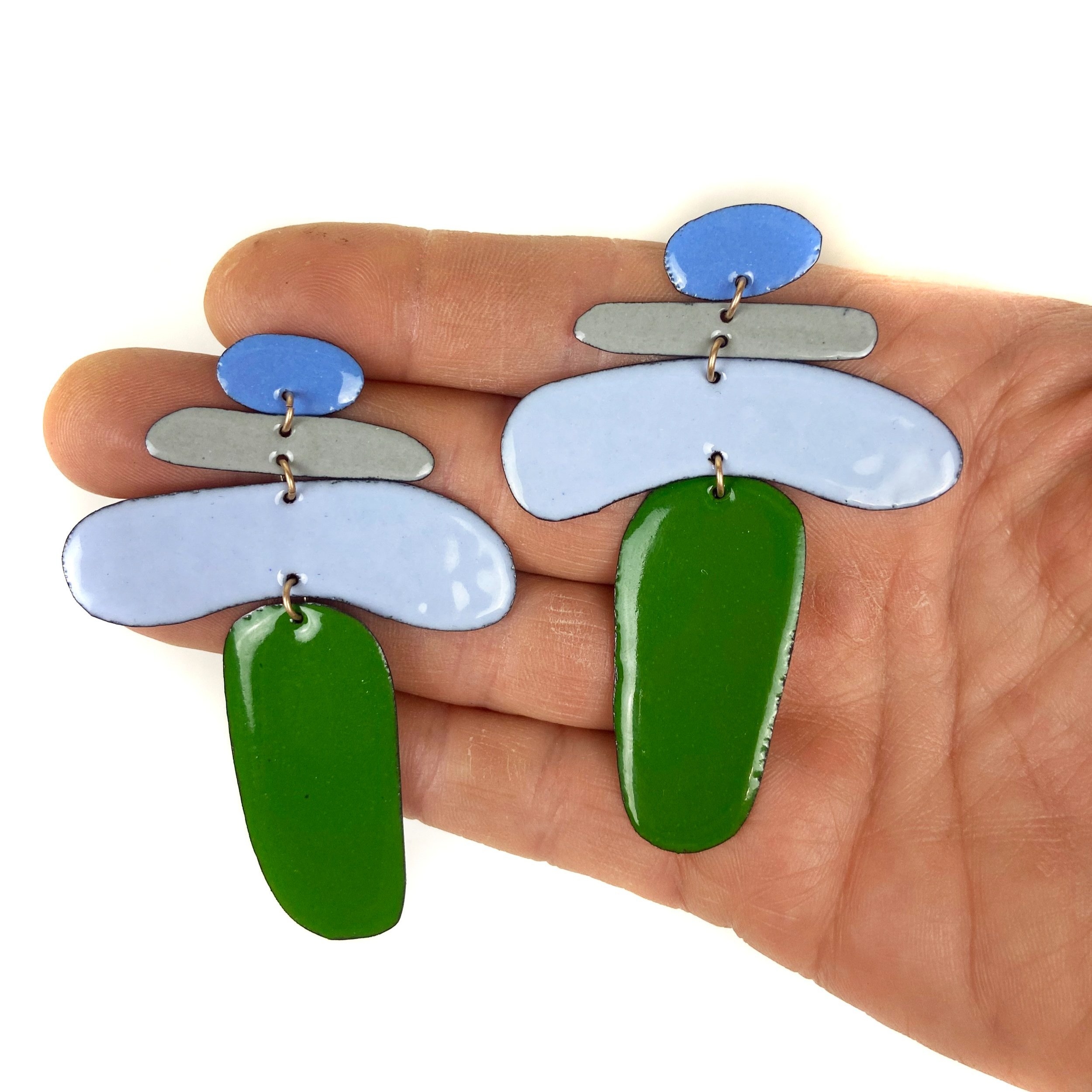 X-Large+Caveman+Earrings+hand.jpg