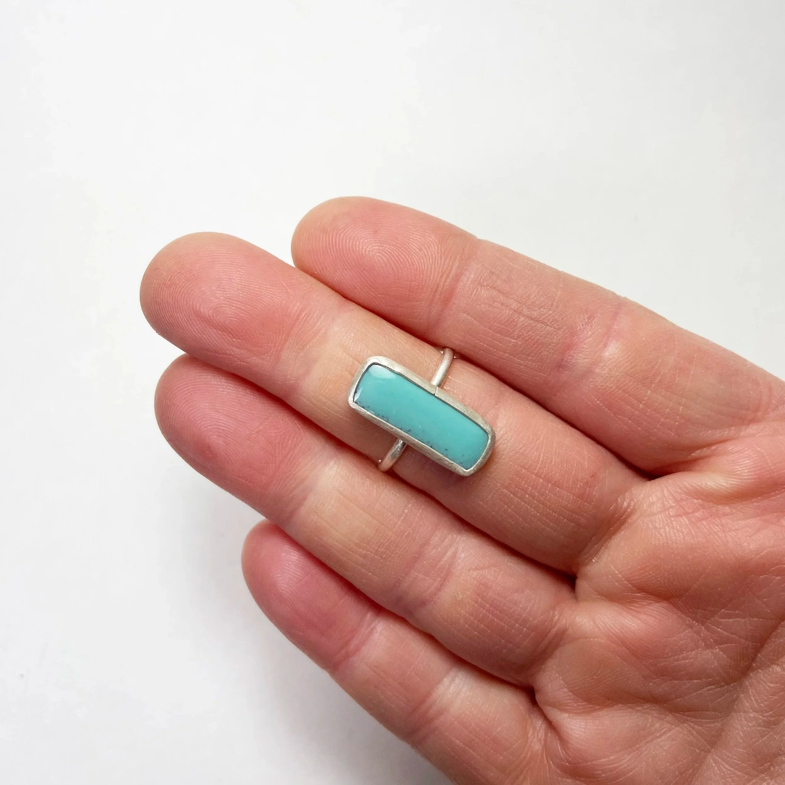 Long+Rectangle+Turquoise+Ring+hand.jpg