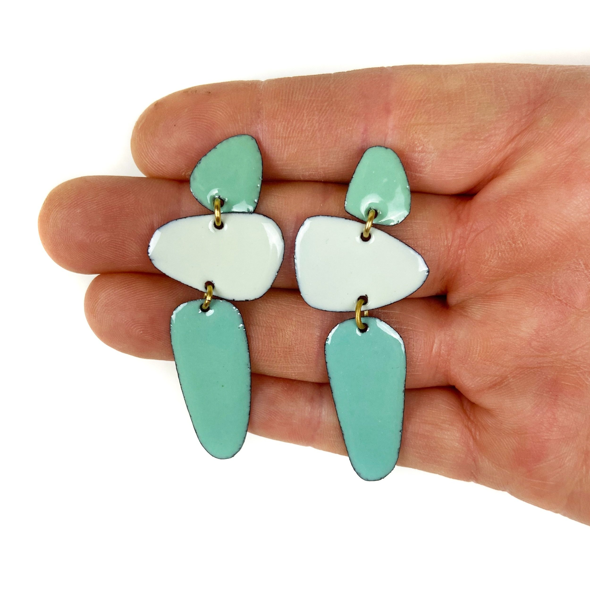 Long+Caveman+Earring+Aqua+green+aqua+hand.jpg