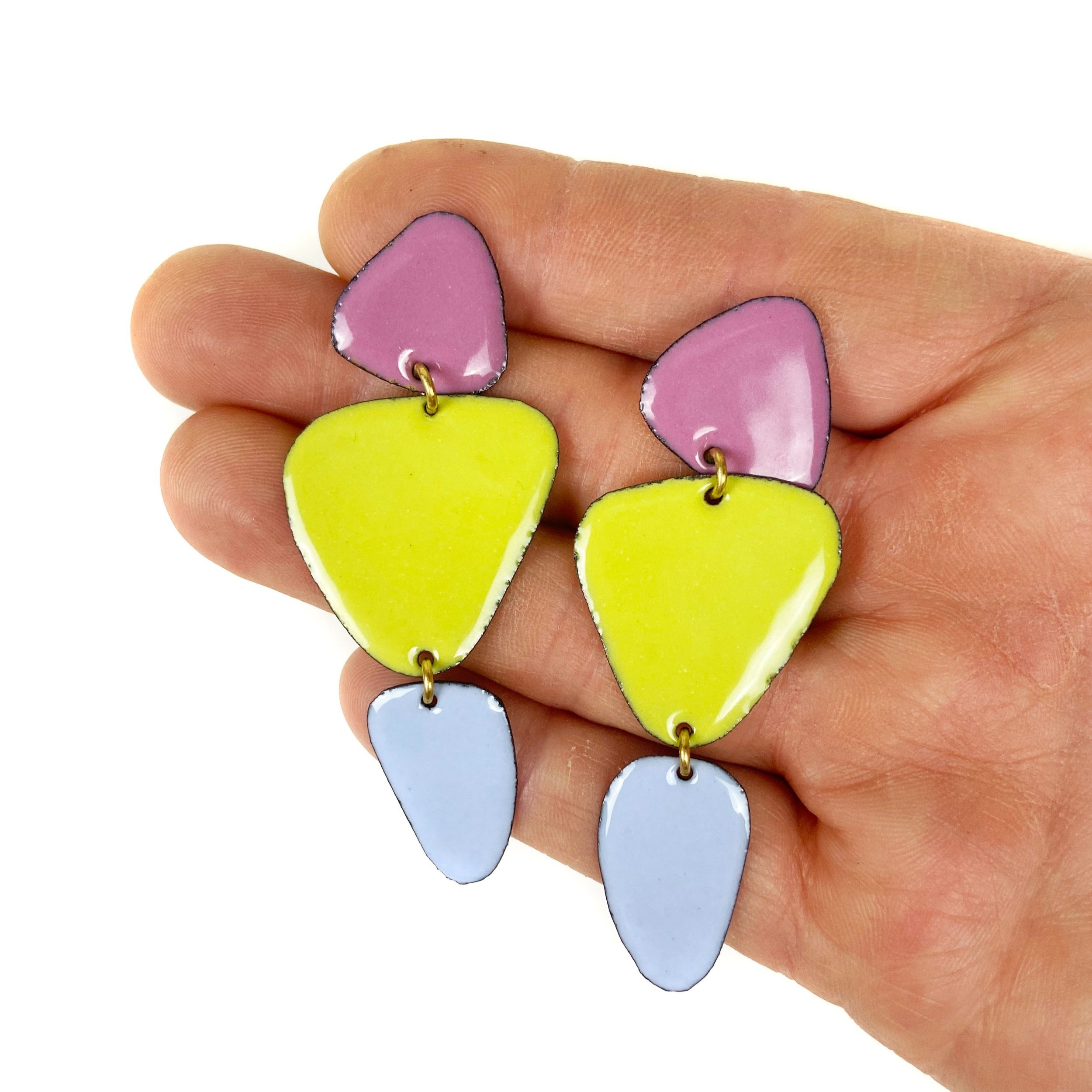 Long+Caveman+Earrings+purple+green+blue+hand.jpg