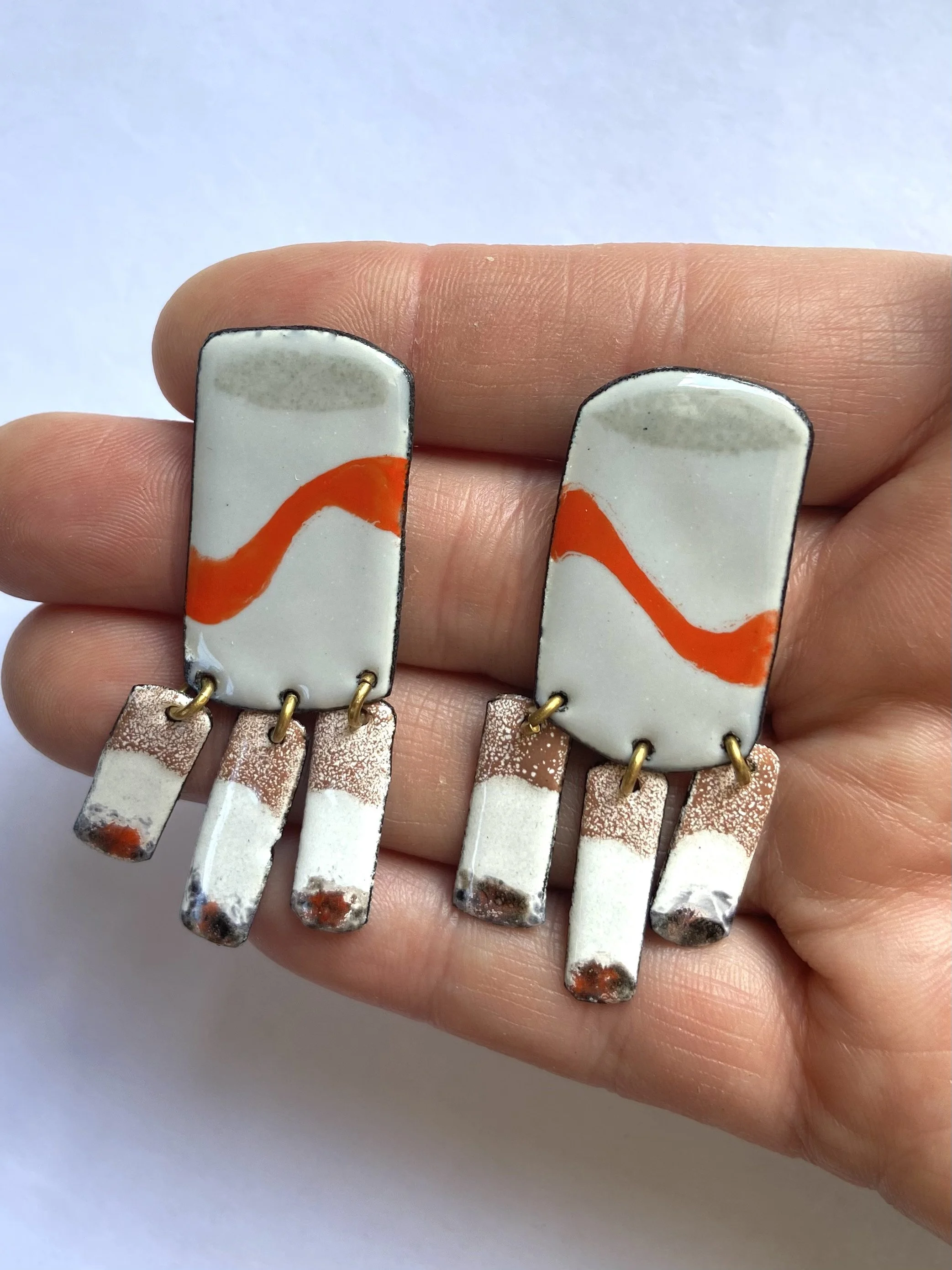 Frig Cig Earring hand.jpg