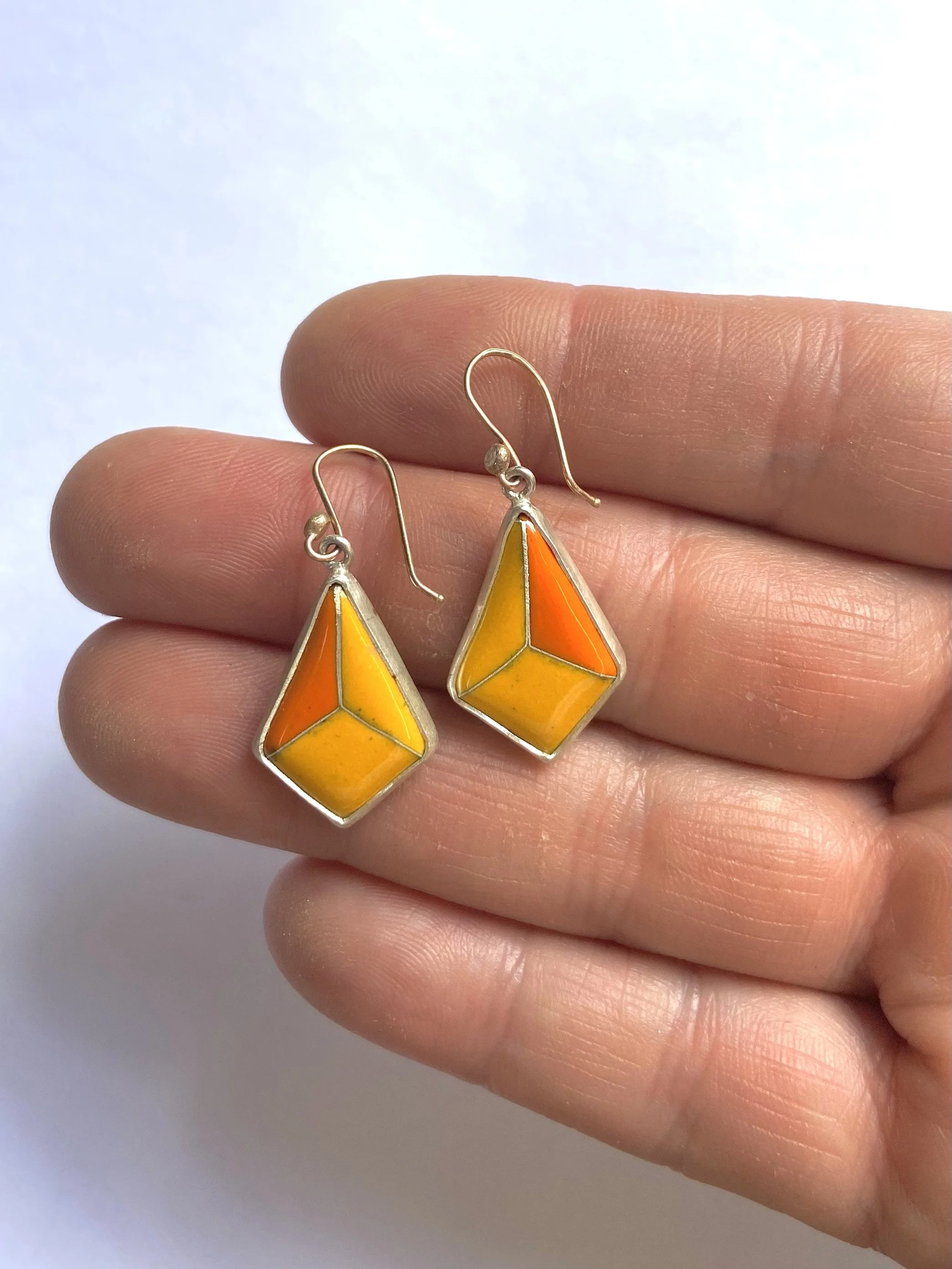 Yellow diamante earrings hand.jpg